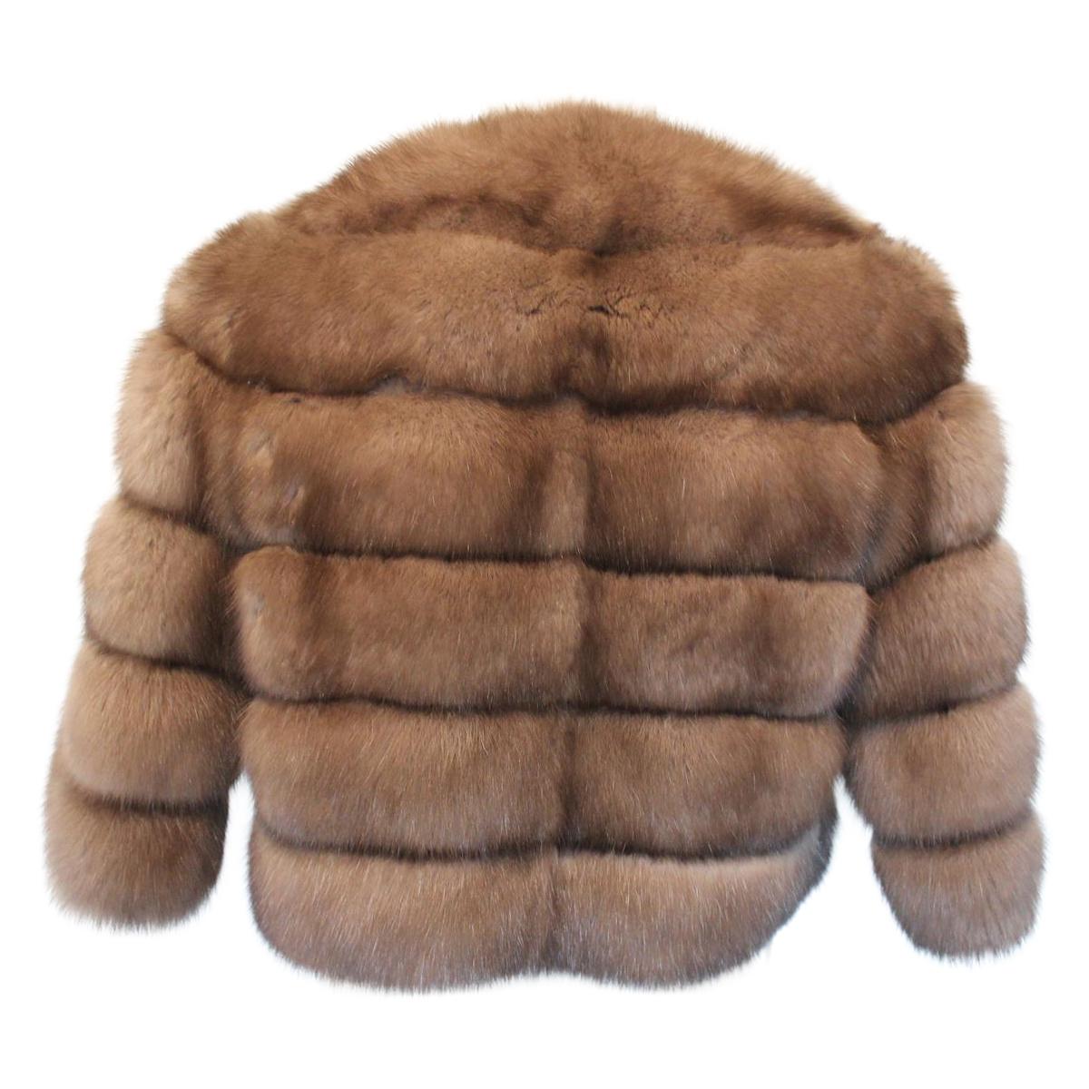 Stunning piece by Pagano, Porto Cervo
Fur jacket
Russian zybeline, 4 top
Reversible
Turtledove color
Two pockets
Weight gr. 500 only (17 oz)
Total length cm 50 (19.6 inches)
Original price € 19500
Express international shipping included in the price