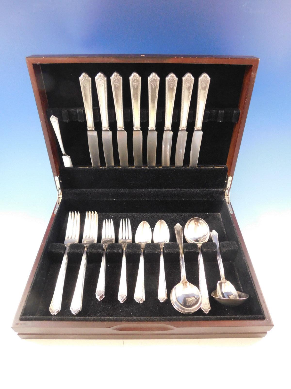 Dinner size pageant by Holmes and Edwards silver plated flatware set - 43 pieces. This set includes:

8 dinner size knives, 9 1/2