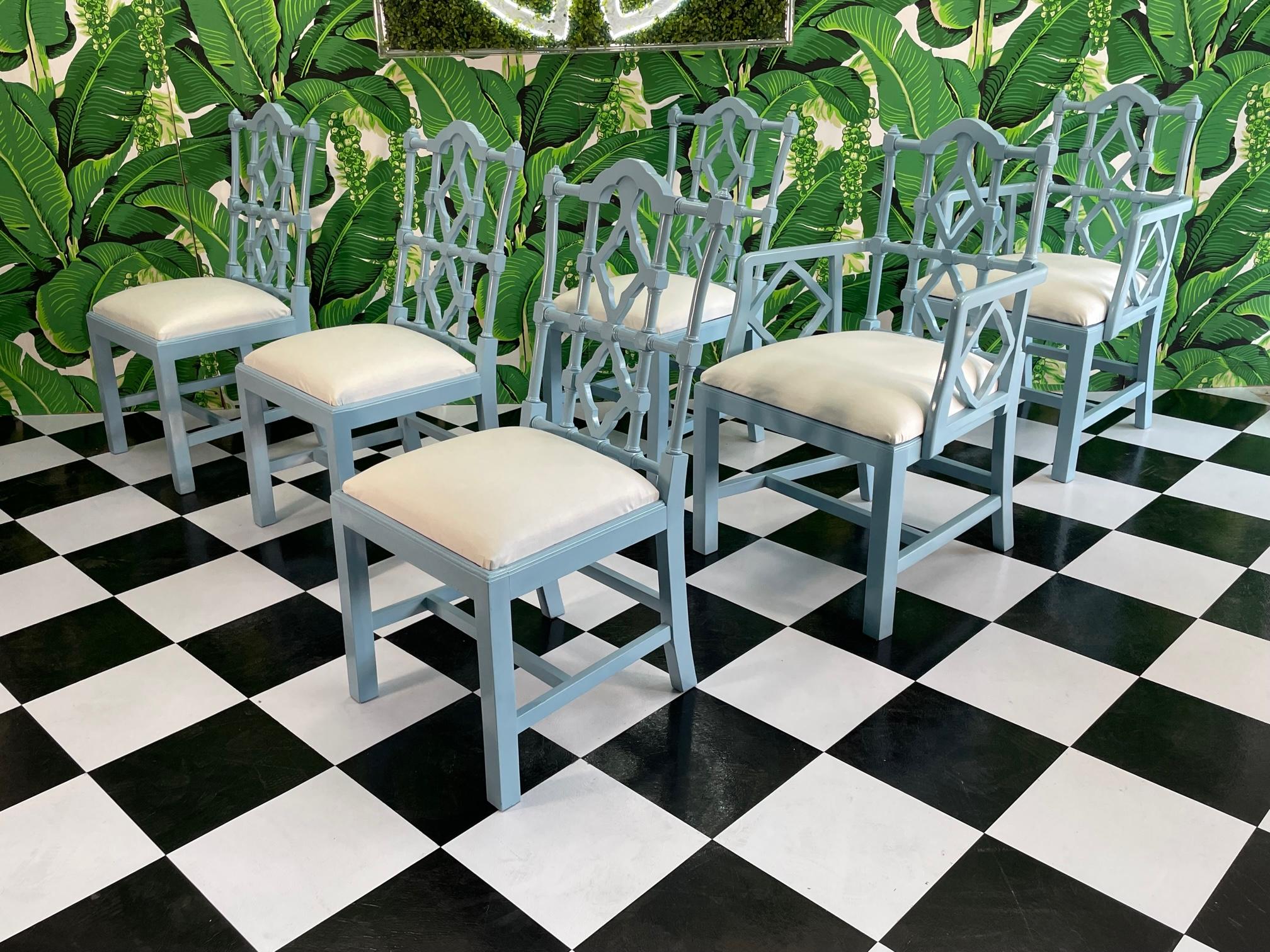 Set of 6 solid wood chairs feature interesting fretwork backs, splayed rear legs, and a high gloss blue finish. Newly upholstered in muslin, ready for your fabric. Solid and sturdy, good condition with minor imperfections consistent with age. See