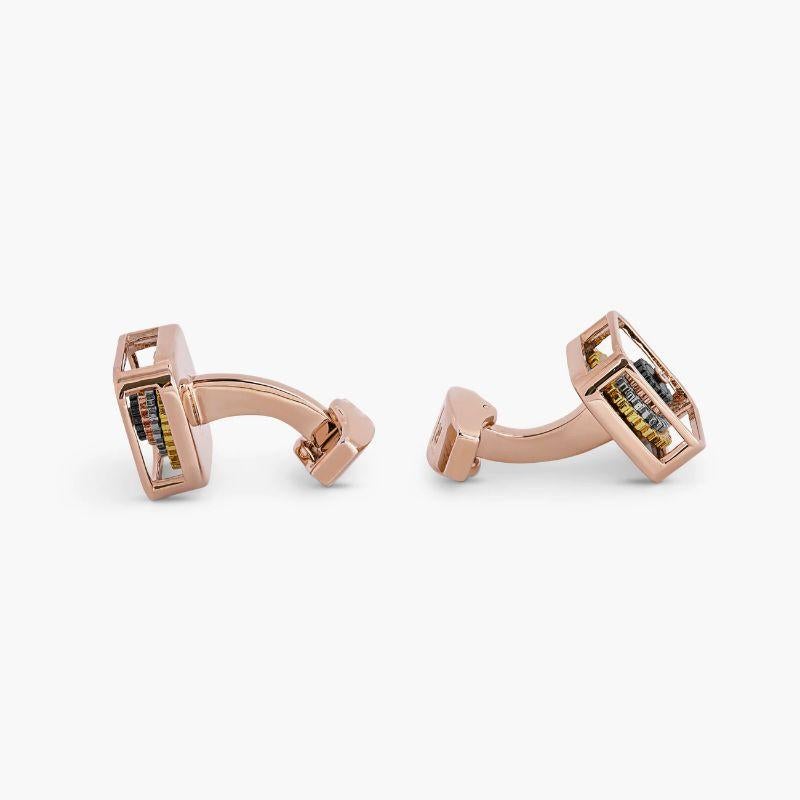 Pagoda Gear Cufflinks with Rose Gold Finish

Inspired by the tiered tower of a pagoda, a spiritual piece of architecture often found in places such as Burma, Japan and South East Asia. These cufflinks feature a carbon fibre inlay, stacked with multi