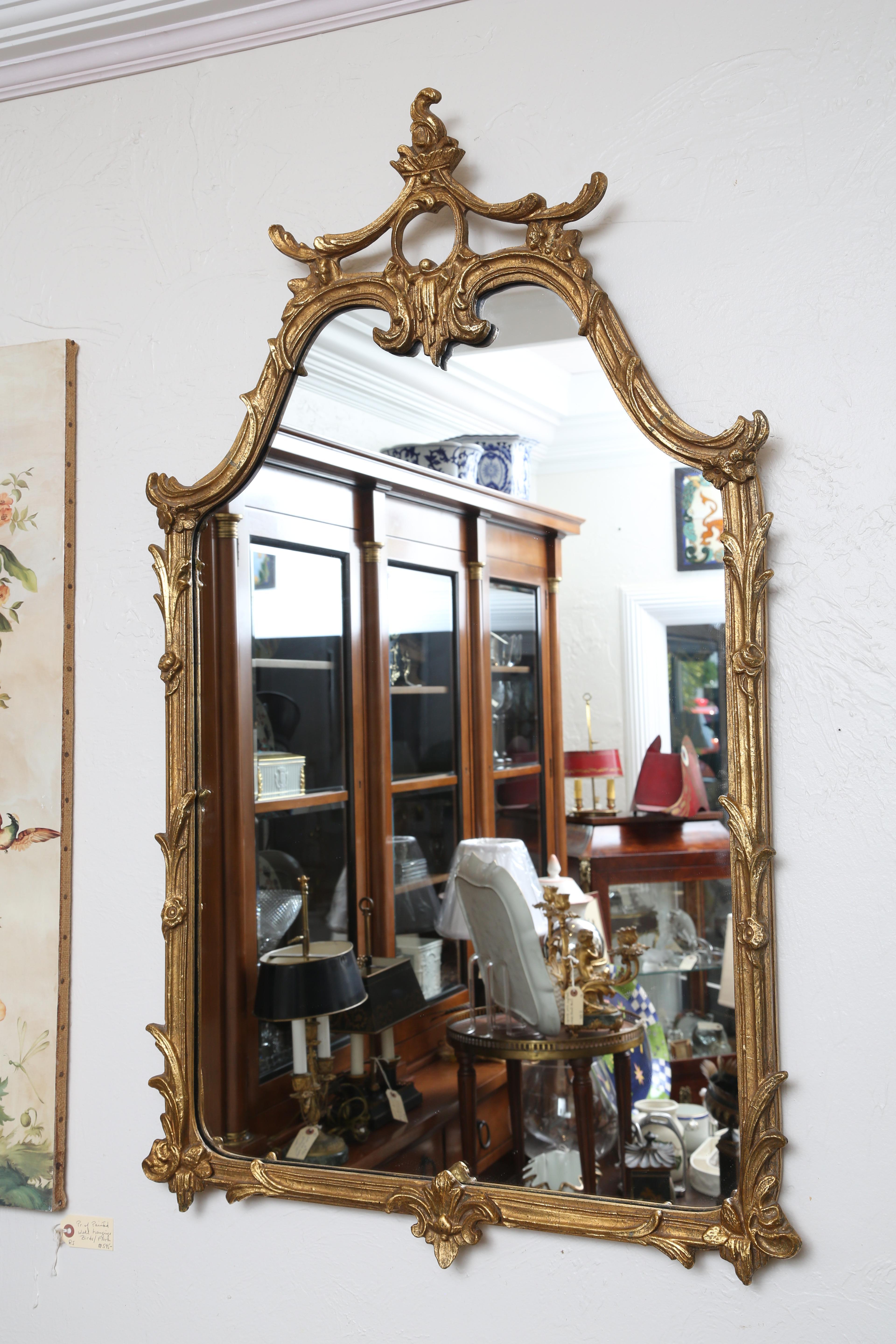 Midcentury wood carved and gilded mirror in a pagoda type form by the Friedman Brothers.