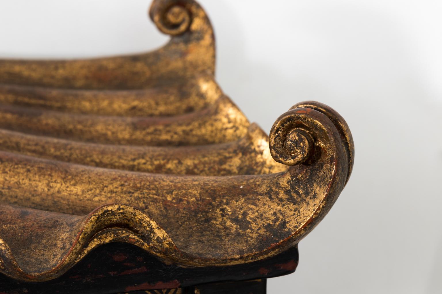 Chinoiserie style painted pagoda wall shelf that features three shelves and a single drawer, circa 1980s.
 