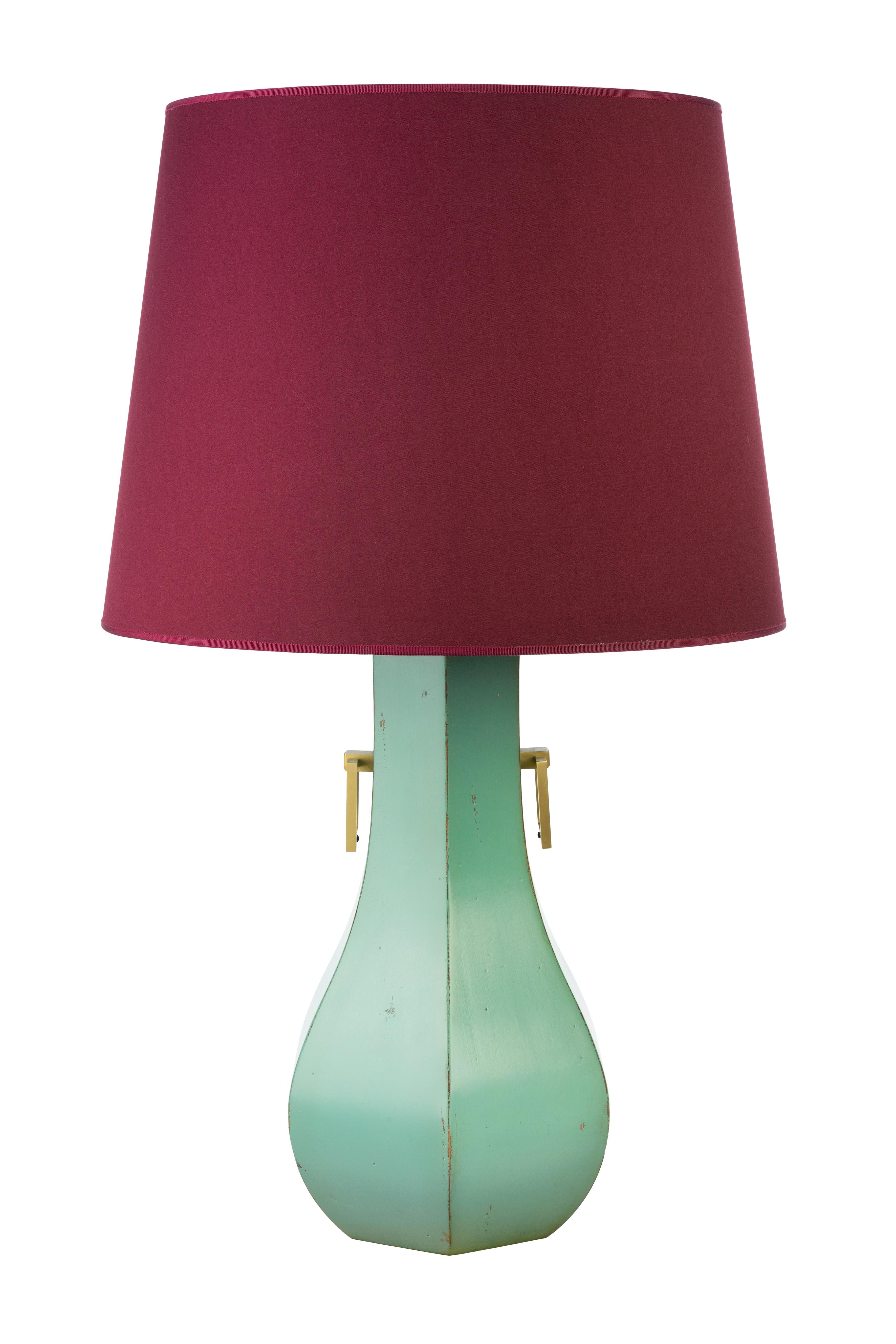Céladon lacquered beech lamp with a turned legs in six-sided and brushed satin brass square ring handle. 
It is a piece of furniture made by hand by the craftsmen of Moissonnier, French cabinetmaker since 1885. Our craftsmen use ancestral know-how