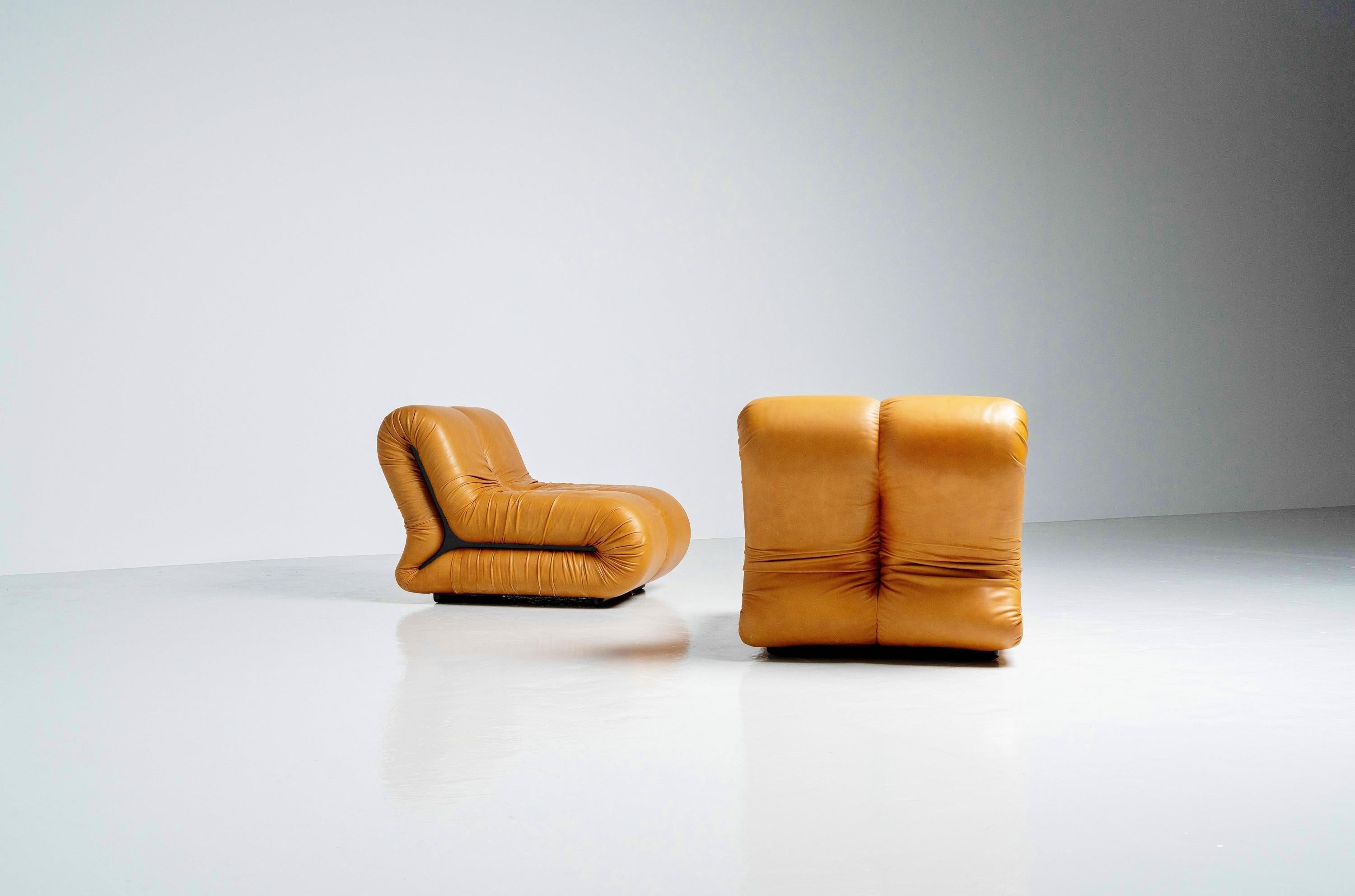 Stunning set of 'Pagru' lounge chairs by designer Claudio Vagnoni and produced in Italy by 1P in 1971. The condition of the chairs are really good, and have never been seperated. There are no diffusions between the chairs and the colour of the