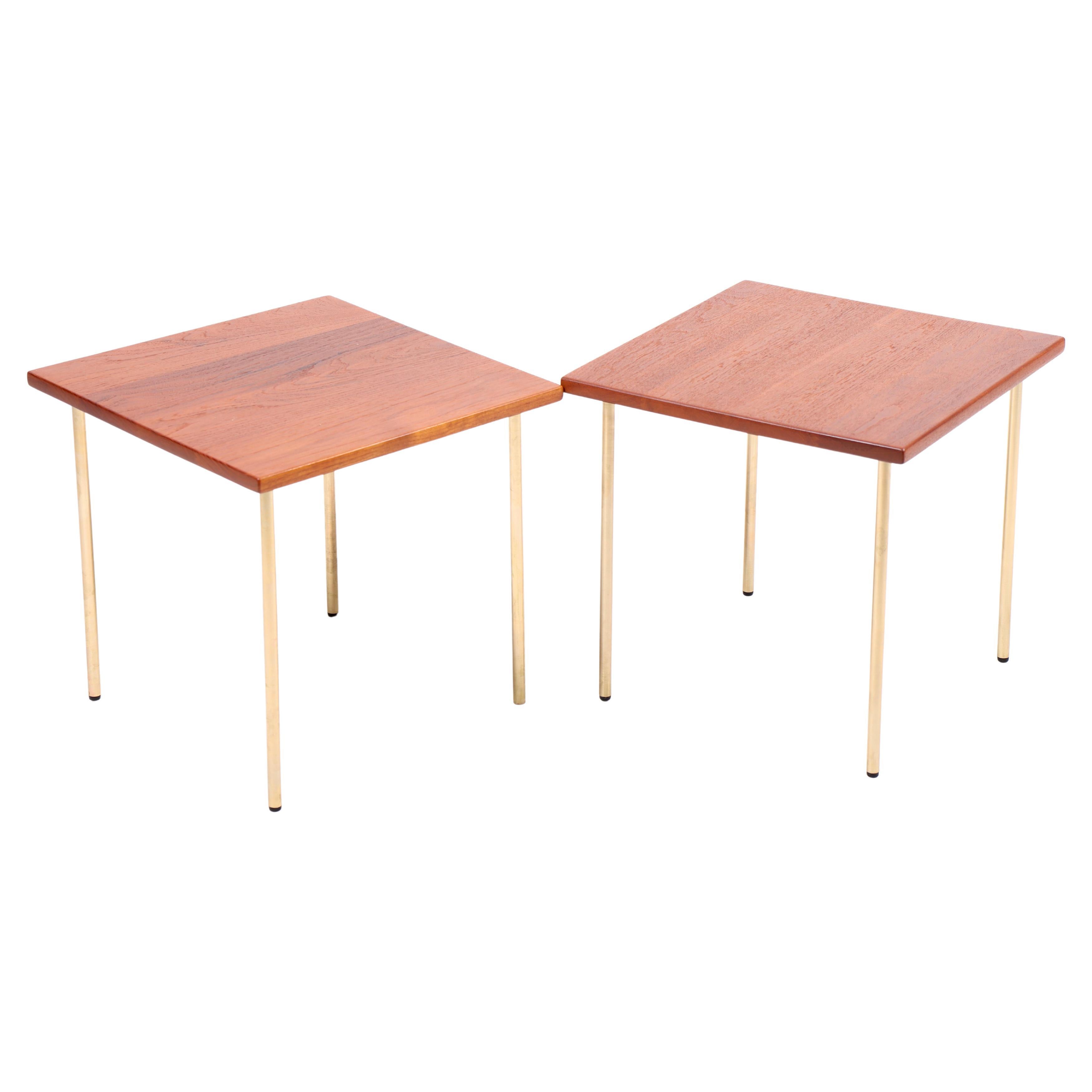 Pair of mid-century side tables in solid teak with brass legs. Designed by Peter Hvidt and Orla Mølgaard for France & Son in 1960s. Made in Denmark. Great original condition.