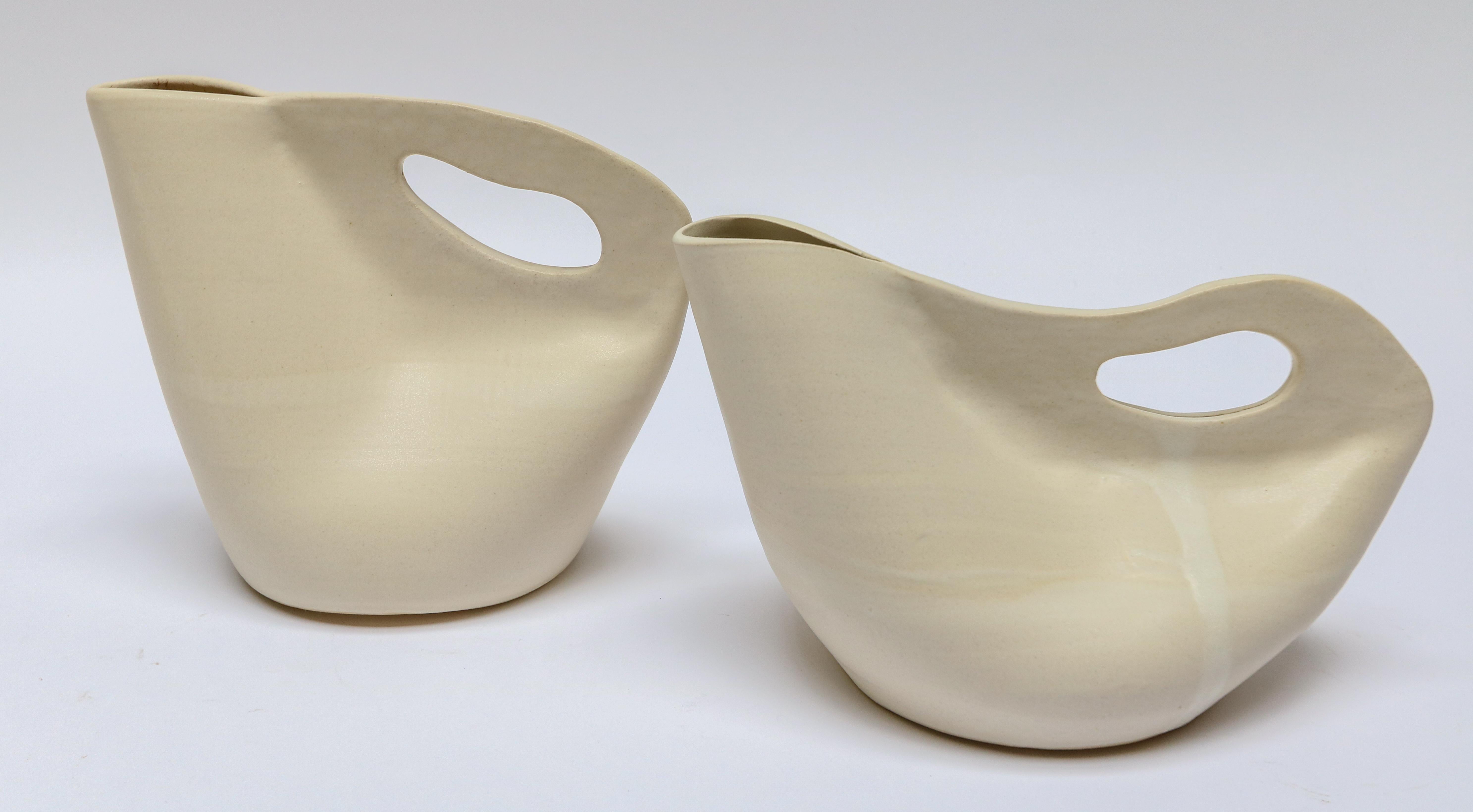 Handmade ceramic Paige pitcher and Gail pour (creamer or gravy boat) by Style Union Home in blanc white. Priced individually.

Measures: Paige pitcher (taller) 10? x 5.5? x 8.5? H (400173)–$285 each
Paige pitcher (shorter) 11? x 6? x 6.5? H