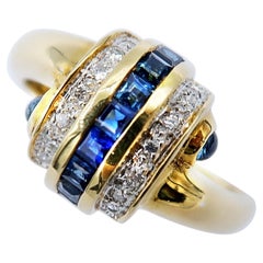 Pain au Chocolat Baguette
Cabochon Blue Sapphire Diamond 18K Gold Bypass Ring Pain au Chocolat Baguette
Cabochon Blue Sapphire Diamond 18K Gold Bypass Ring