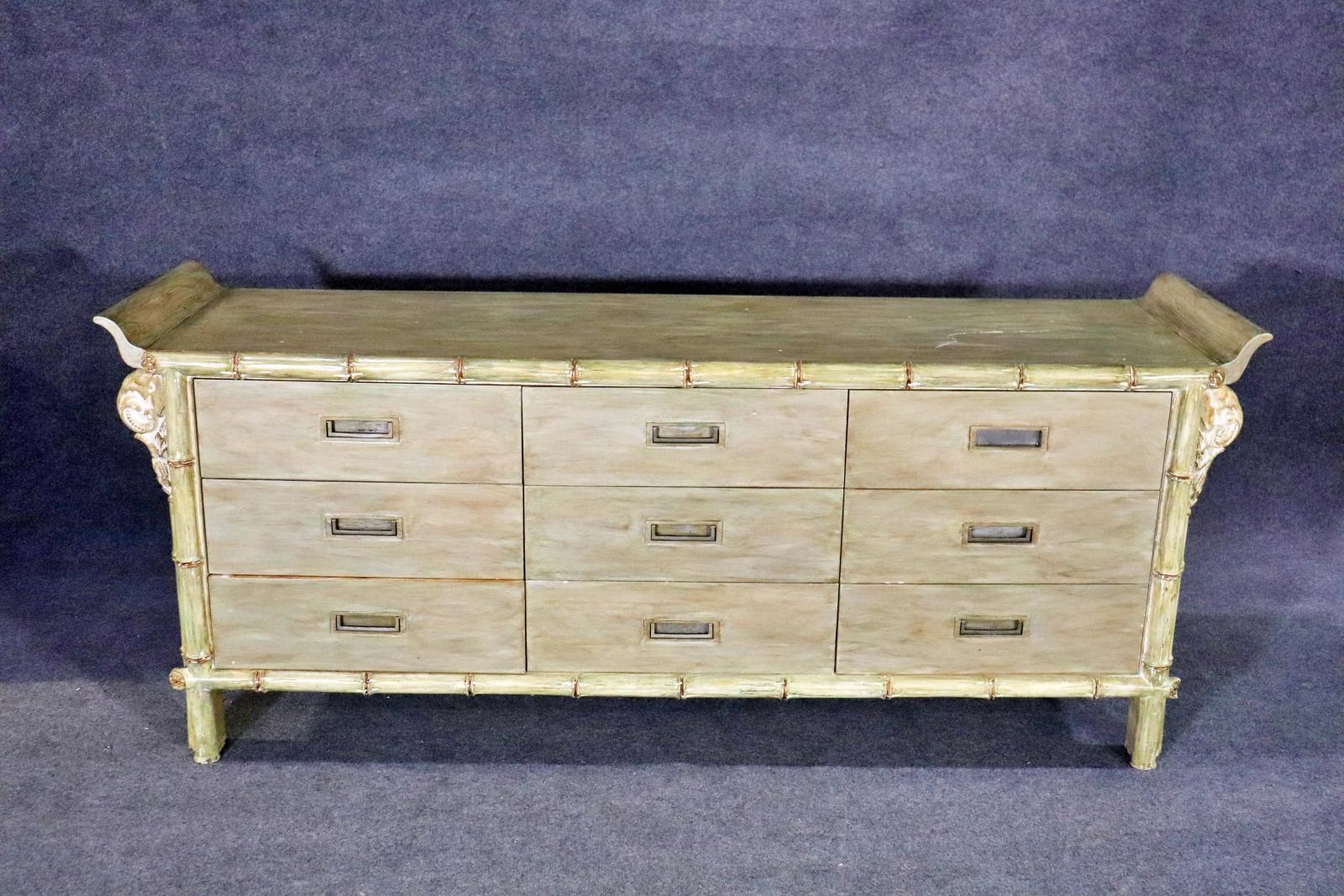 Wood. 9 drawers. Painted. Faux bamboo. Metal hardware. 33 1/2