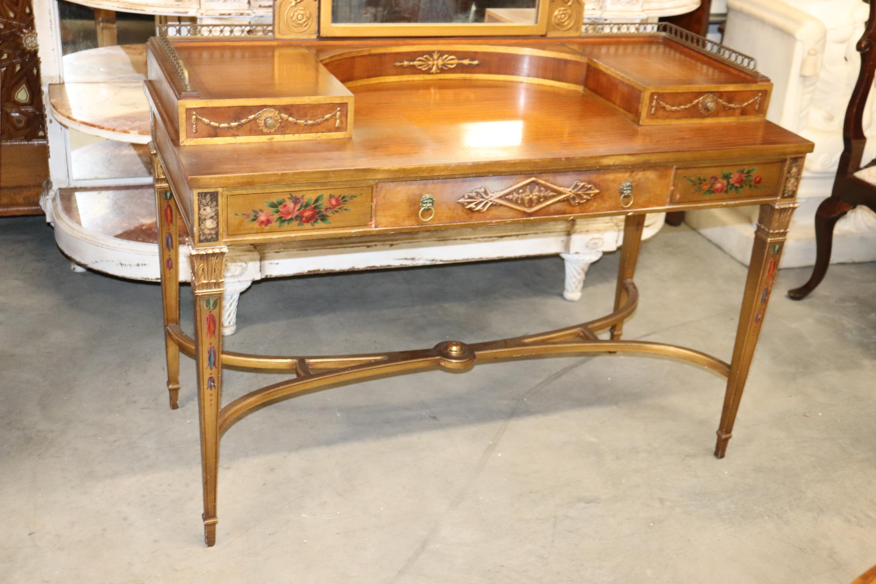 This is a superb antique English paint decorated Adams vanity. Look at the gorgeous wood quality and the fantastic patina and time-worn painted details. The vanity measures 48 wide x 63 tall x 22 deep and the surface is 30 inches and the kneehole is