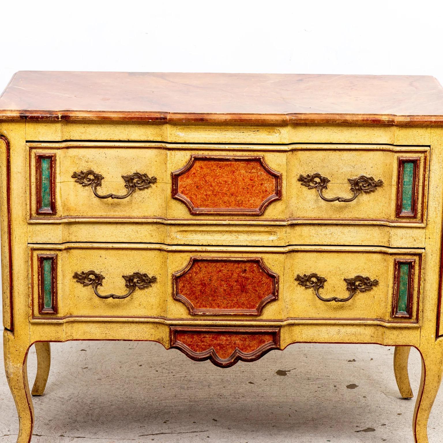Hollywood Regency period paint decorated chest. The case featuring panels painted to mimic stone, along with a faux stone painted shaped top. Cabriole legs and an undulating front give this chest a sculptural facade. Please note of wear consistent