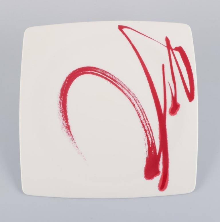 Paint It Red Collection - Red Vanilla, Royal Fine China, a set of eight dinner plates in modern design and abstract motif.
Late 20th century.
Marked.
In perfect condition.
Dinner plate: D 26.7 cm.