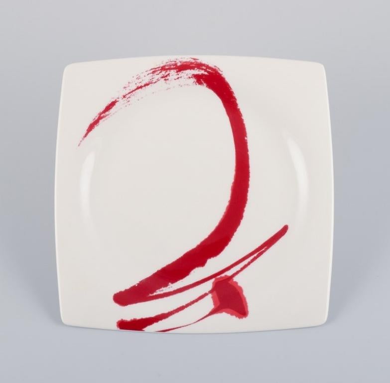 Paint It Red Collection - Red Vanilla, Royal Fine China, set of eight lunch plates in modern design with abstract motif.
Late 20th century.
Marked.
In perfect condition.
Dimensions: D 20.5 cm.