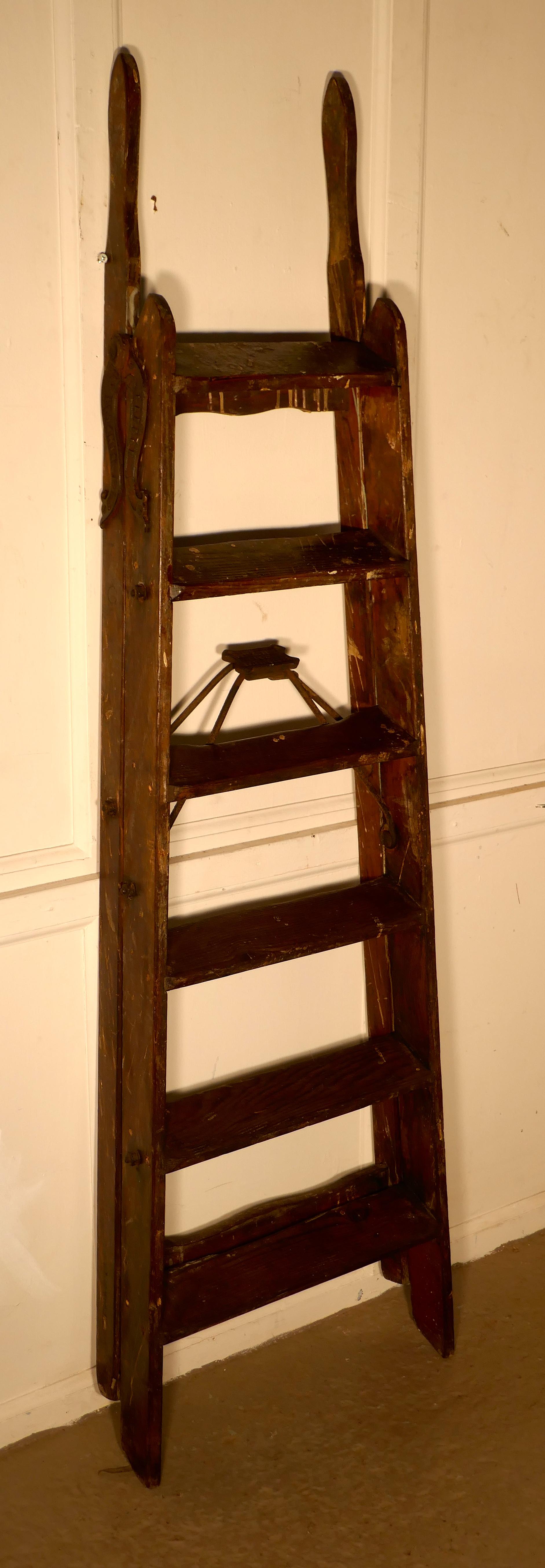 Paint splattered simplex safety step ladder

This is a very useful and marvelous looking piece, the step ladder has 2 good long upright grab handles, it has a the Simplex snap action making it very sturdy and stop any chance of collapse just by