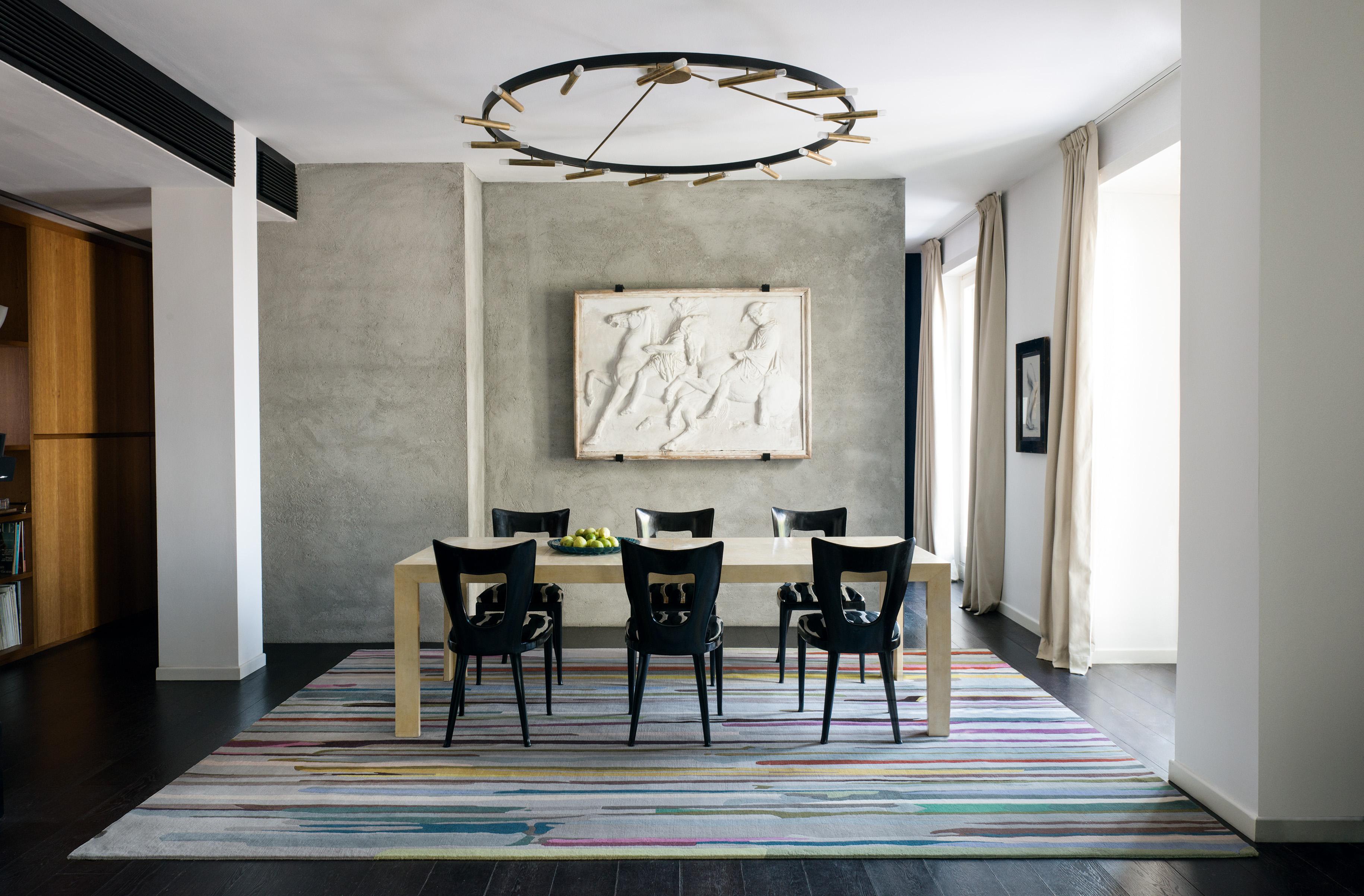 The Paint Stripe rug was inspired by Mid-Century Modern abstract art. This style of action painting is referred to as drip painting. The rug represents a canvas with expressive drips of color creating a wonderful broken stripe