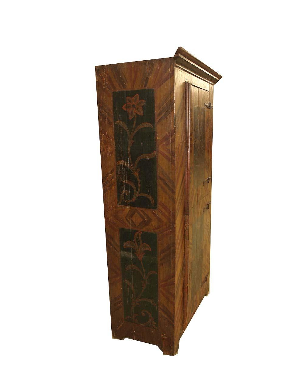 Painted two door cupboard with cove cornice across the front; sides and front painted with stylized floral panels surrounded by diagonal stripes of alternating red and brown on an antique gold color background, top and bottom interiors with shelf.