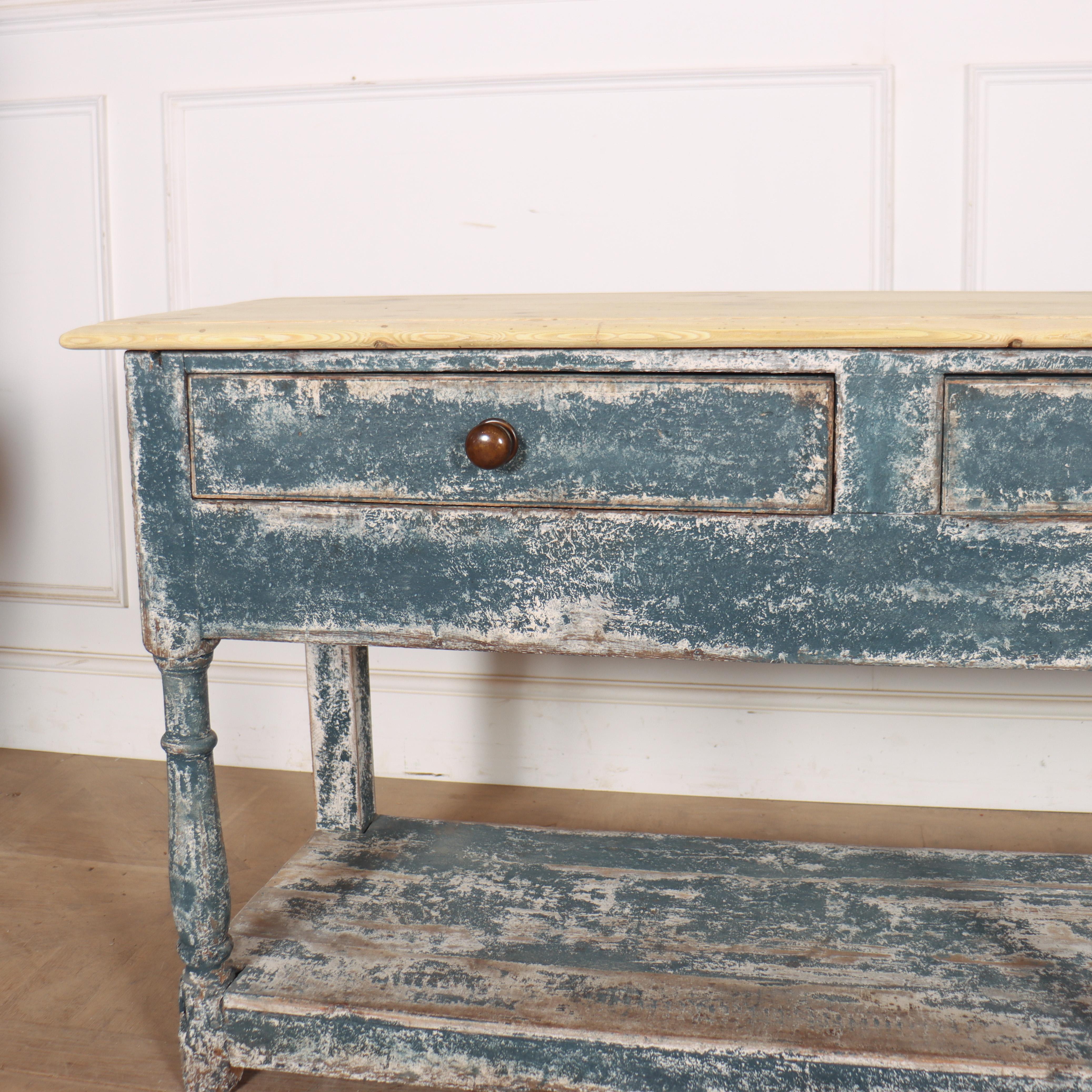 Good 19th century English painted 3 drawer potboard dresser base with a scrubbed pine top. 1810. 

Code: 8770

Dimensions:
W: 74