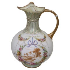 Painted and gilded parian pitcher