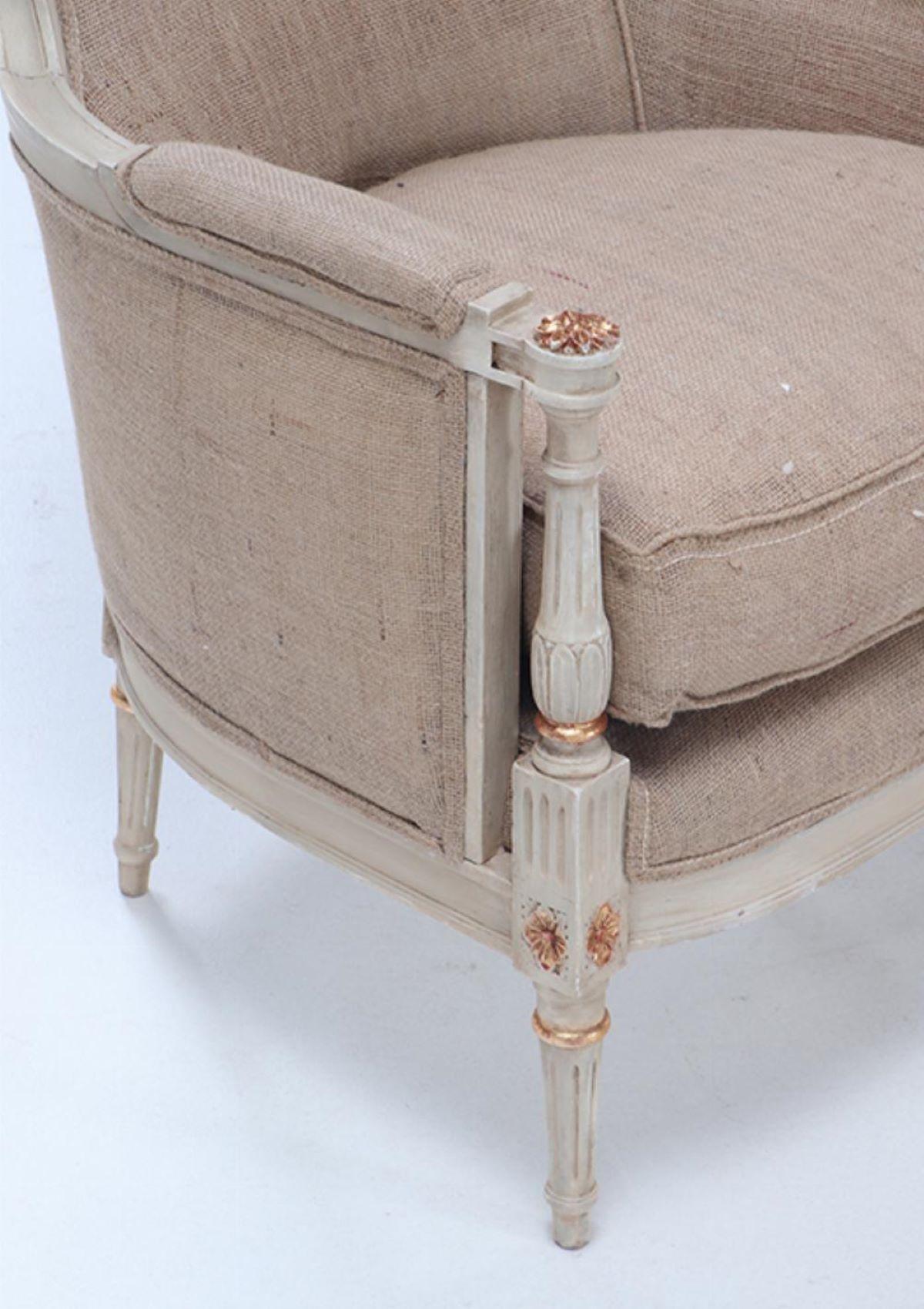 Upholstery Painted and gilt Louis XVI style bergere chairs circa 1950. For Sale