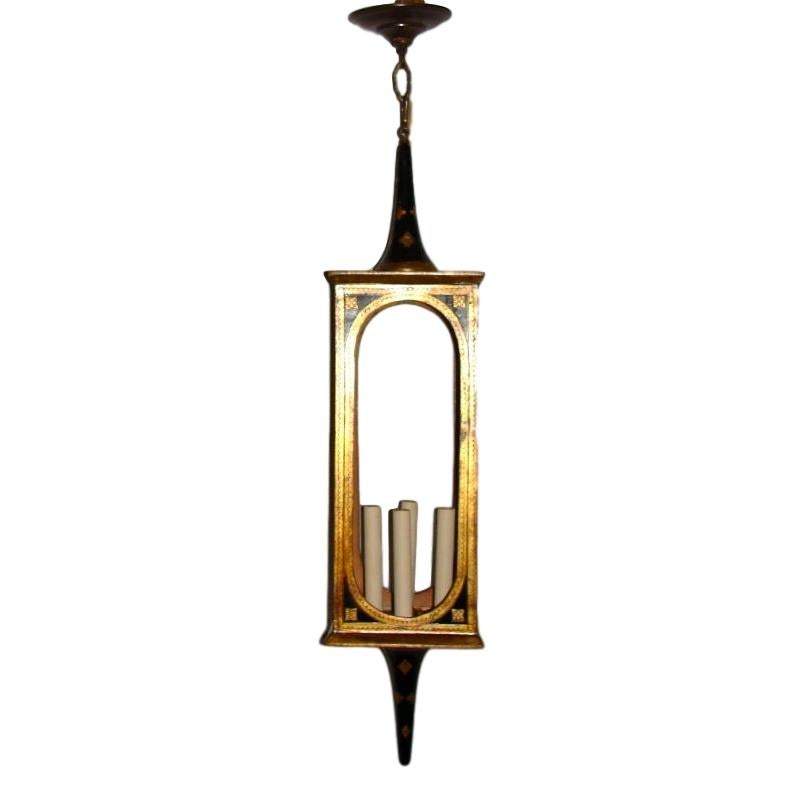 A Italian painted wood lantern with interior lights, circa 1940s.

Measurements:
Height 35