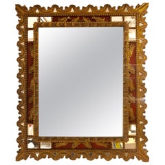 Miroir en bois peint et doré