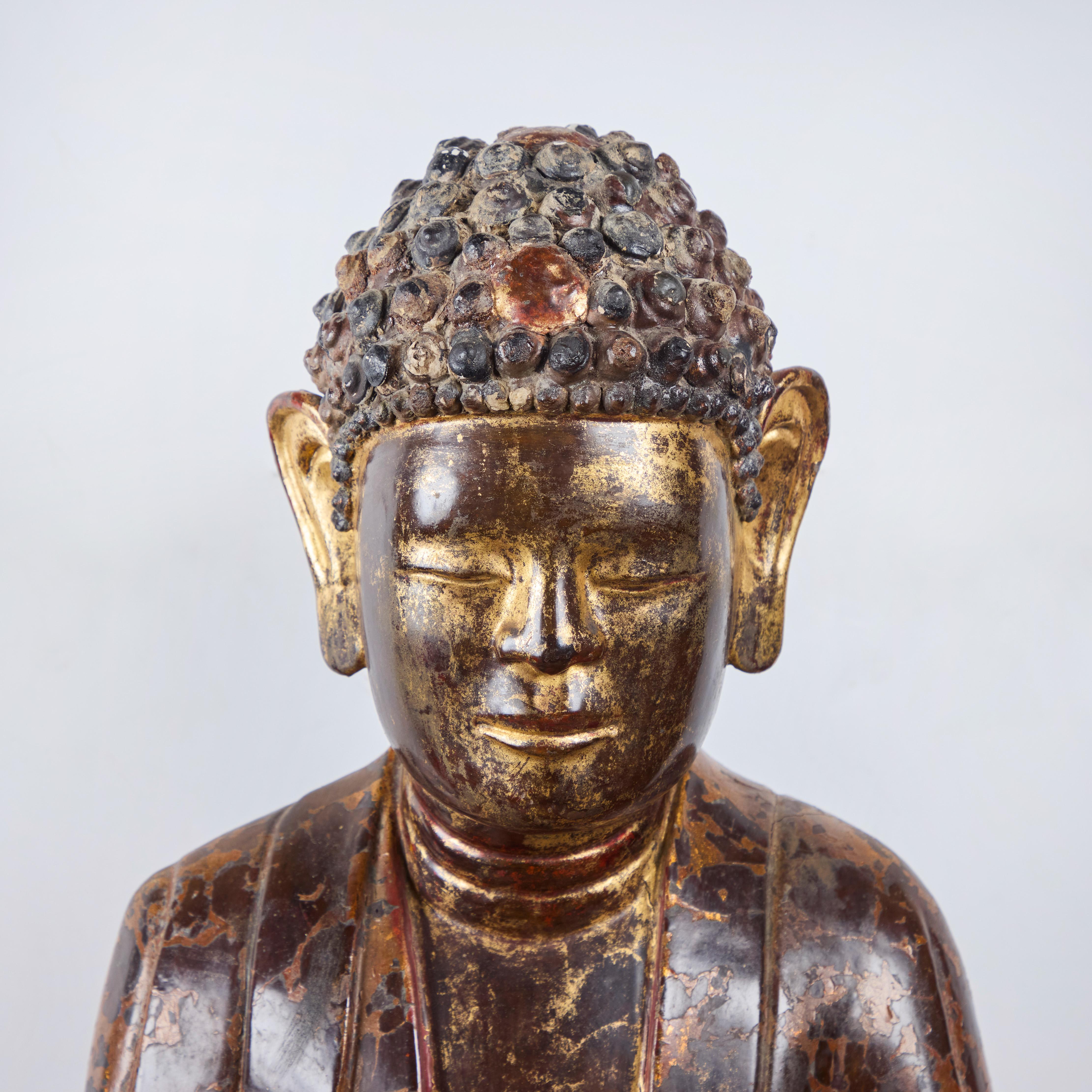 20th Century Painted and Parcel Gilt Seated Buddha with Presentation Stand For Sale