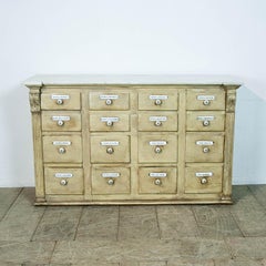 Painted Bank of Drawers with a marble top and enamel name plates