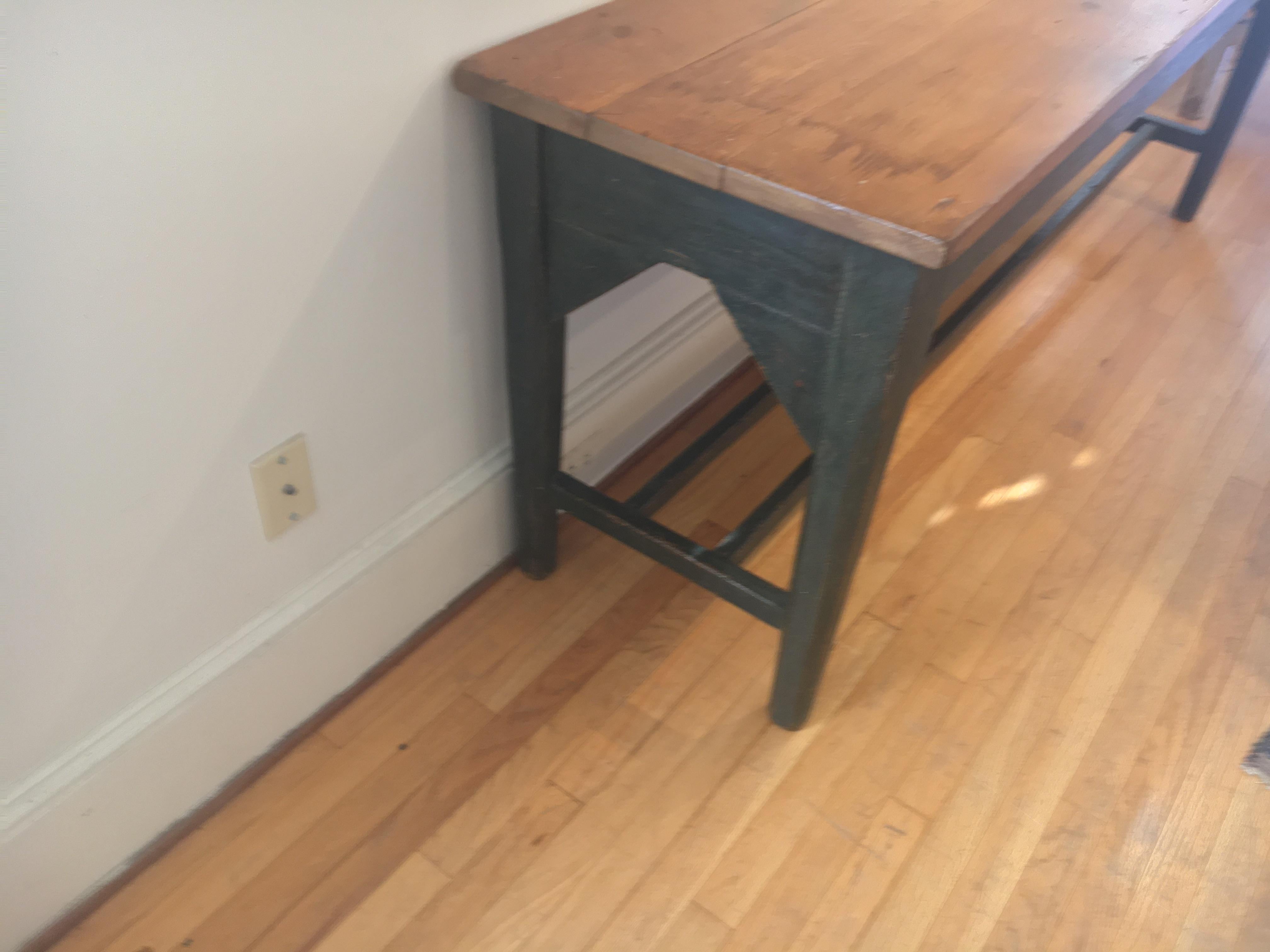 the Irish have cross stretchers on the base of many pieces and is more unusual in Canadian pieces. If you are looking for a long sideboard or long sofa table this is your piece. The deeper green color against the table top is an excellent contrast.