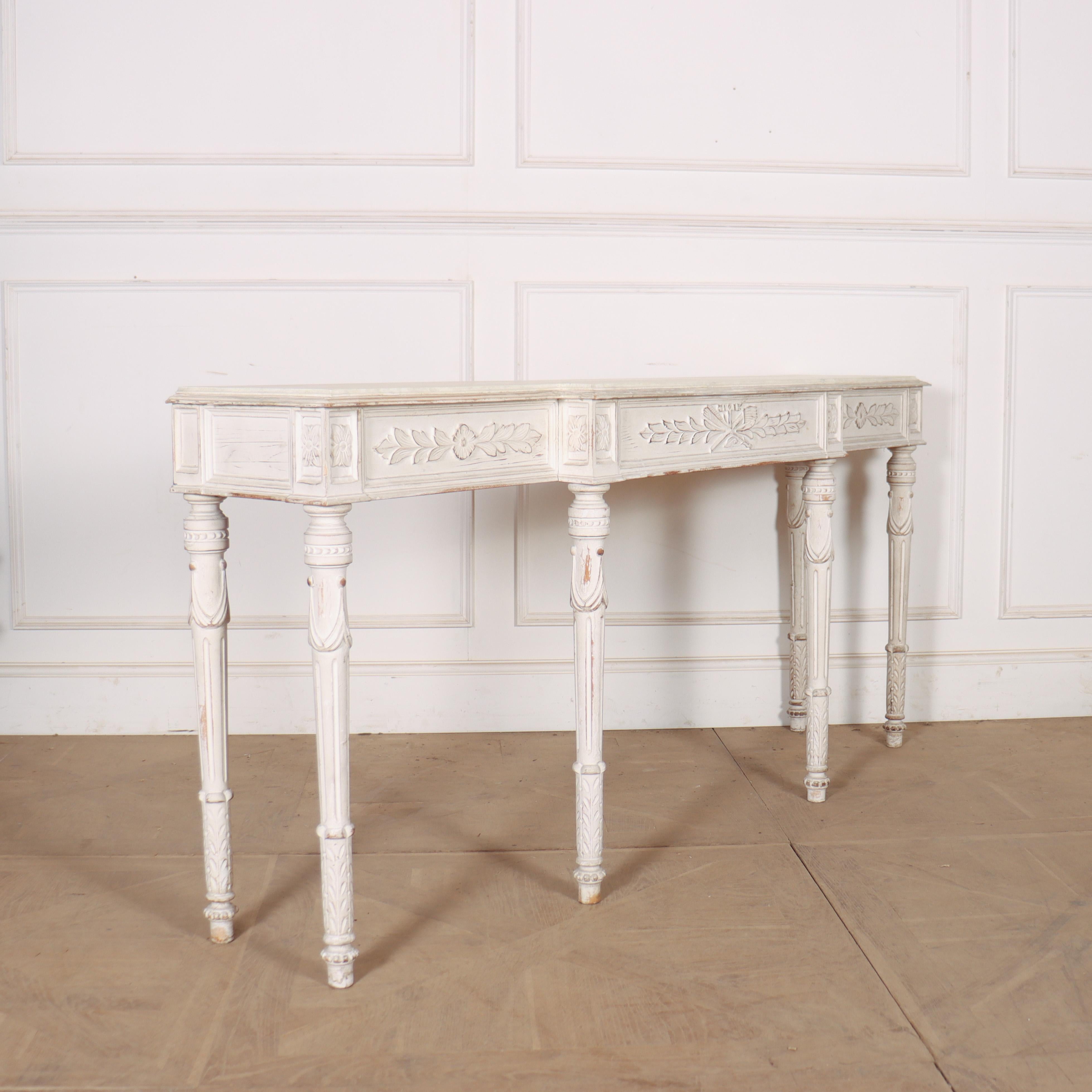 20th century French painted pine breakfront console table with carved legs, a frieze rail and a faux marble top. 1950.

Code: 8817

Dimensions:
W: 71.5