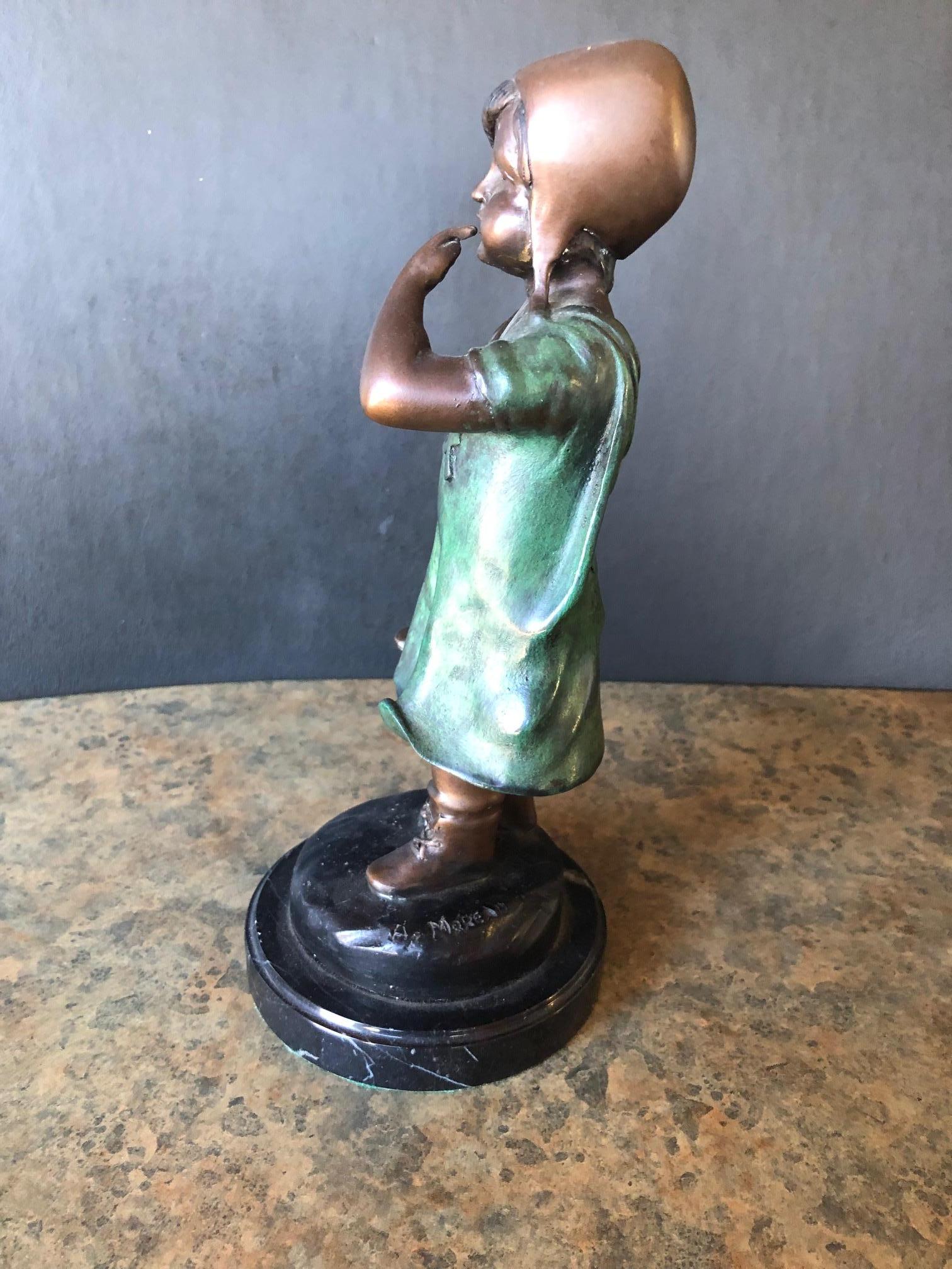 A very nice decorative painted bronze sculpture of a young girl by Auguste Moreau. The piece has nice detail and is signed; it sits on a 4.5