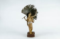 Bemalte Bronzeskulptur einer Frau, die ein Blatt Palmenblatt hält, von Franz Bergmann, Österreich