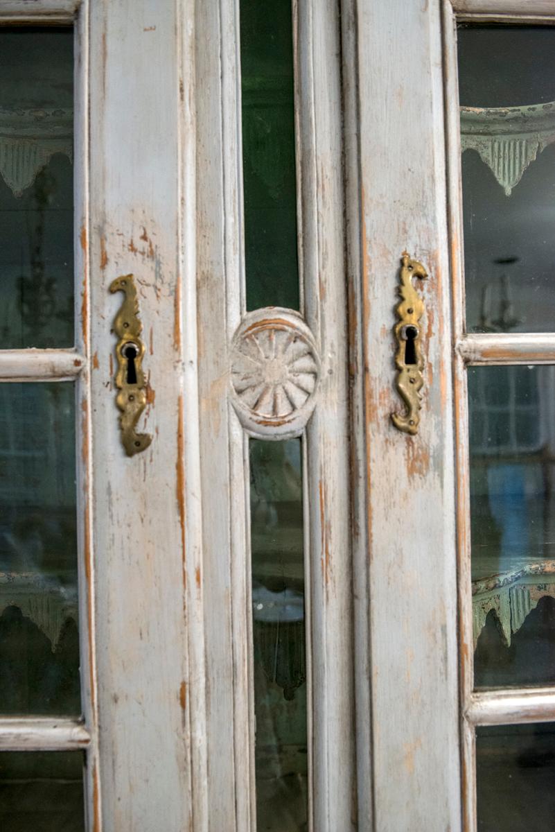 19th Century Painted Buffet du Corps two-Piece cupboard with glass doors.