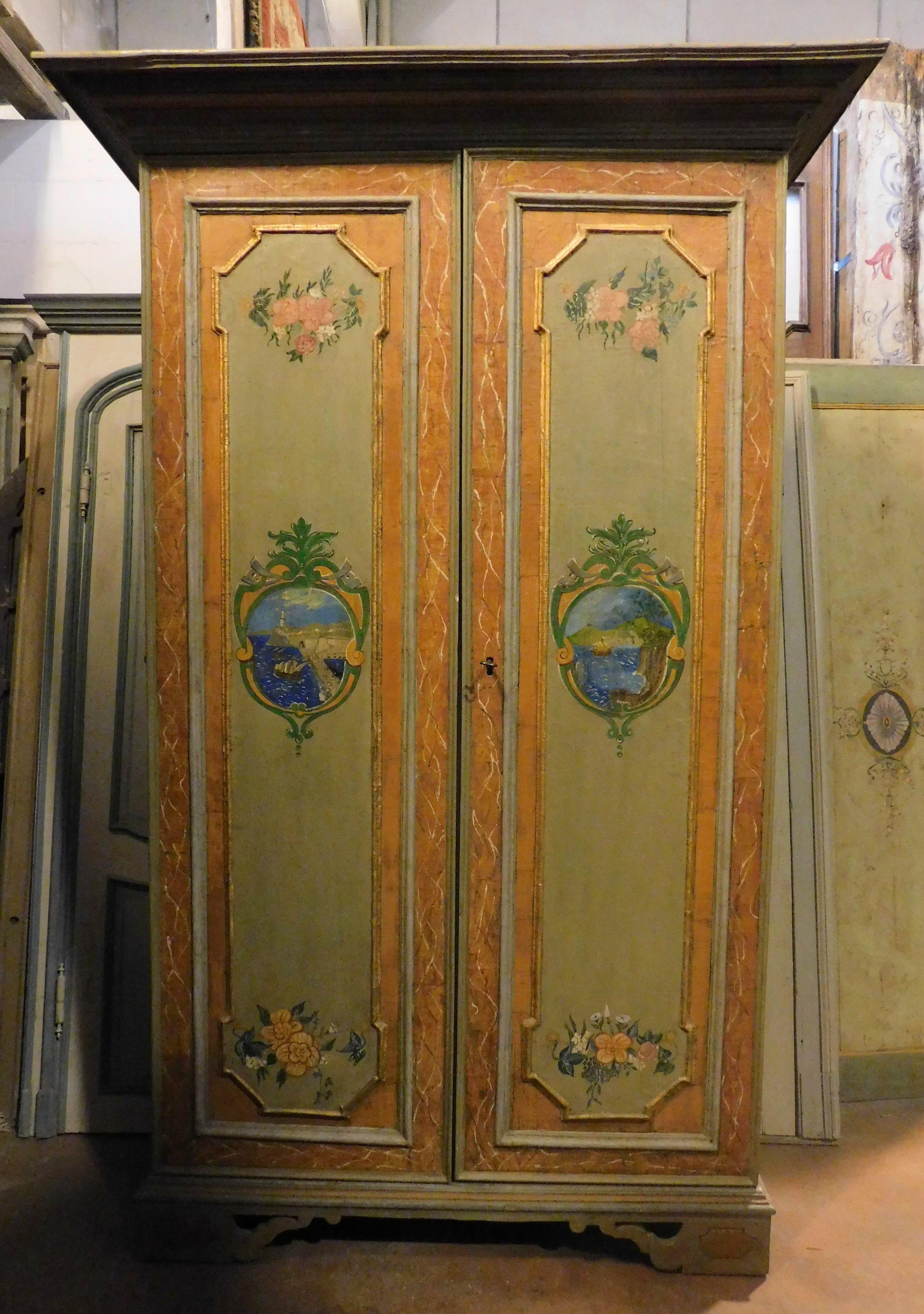Antique wardrobe, hand-painted piece of furniture with maritime views, floral decorations and carved moulds, views of Genoa (Italy), which is where the piece of furniture comes from, hand-built in the 19th century.
maximum size cm H 244 x w 190 x D