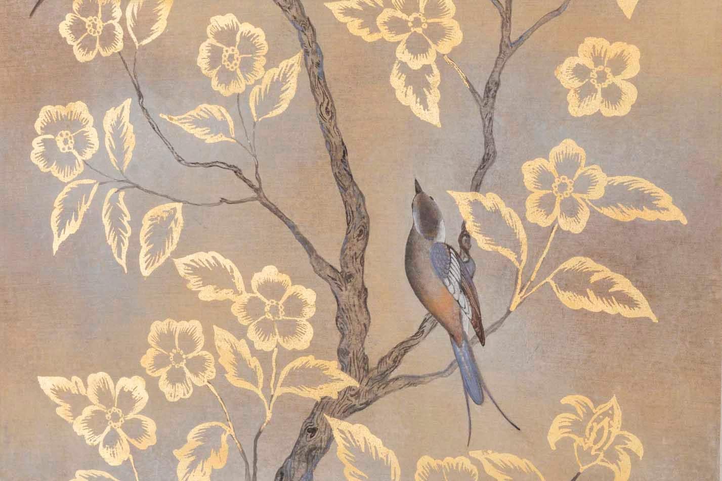 Painted canvas figuring three birds, two on a tree and the other one flying. The tree is represented with gilt leaves and flowers. Background in grey and brown tones.

Linen raw canvas hand painted with natural pigments and background gilt with