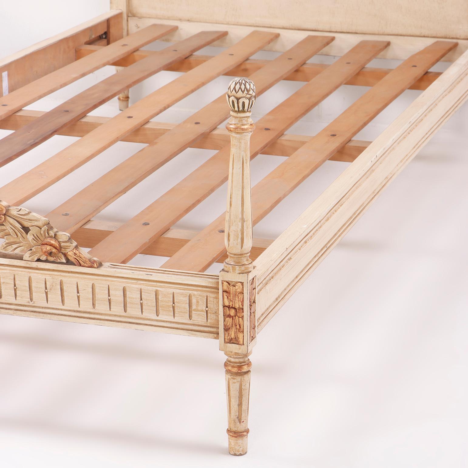Painted, carved and gilt Louis XVI style twin size beds circa 1950. In Good Condition For Sale In Philadelphia, PA