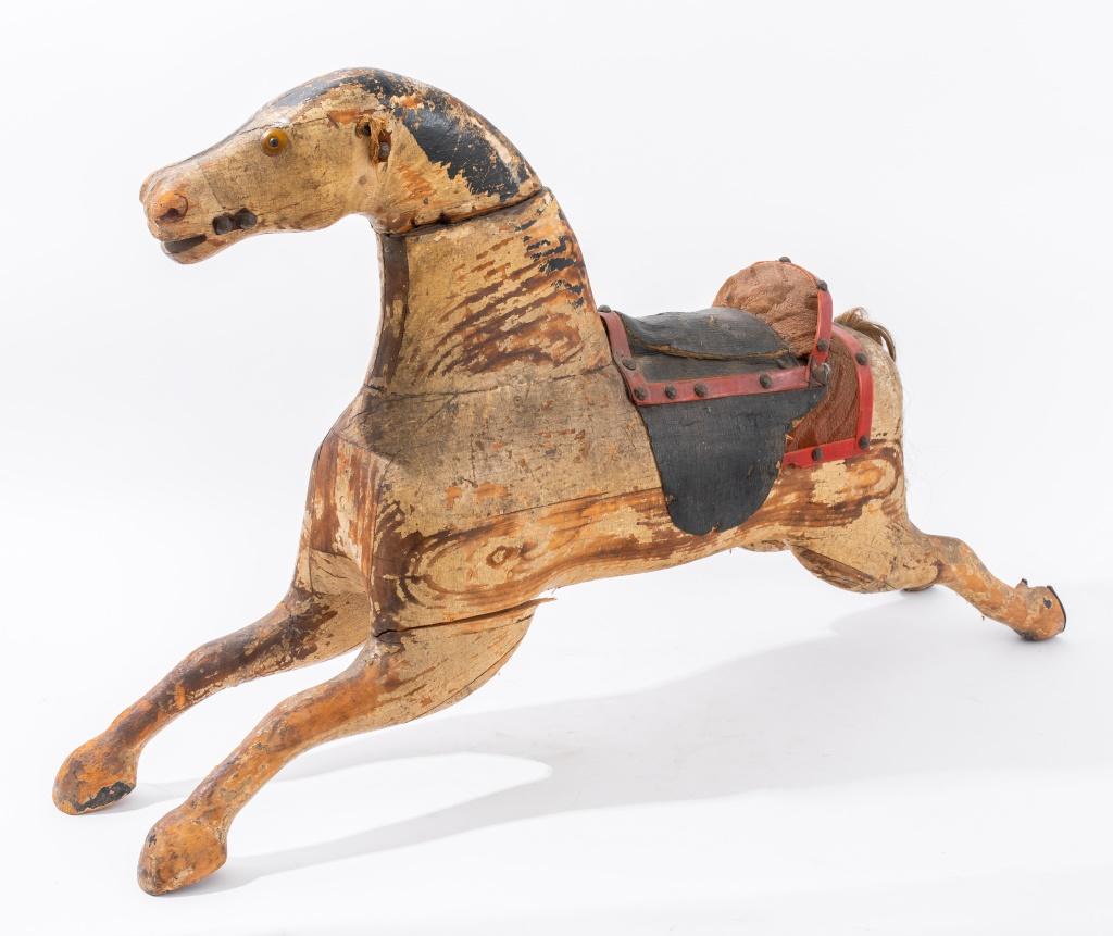 Child's carved rocking horse glider with paint decoration, likely circa late nineteenth century.

Dealer: S138XX