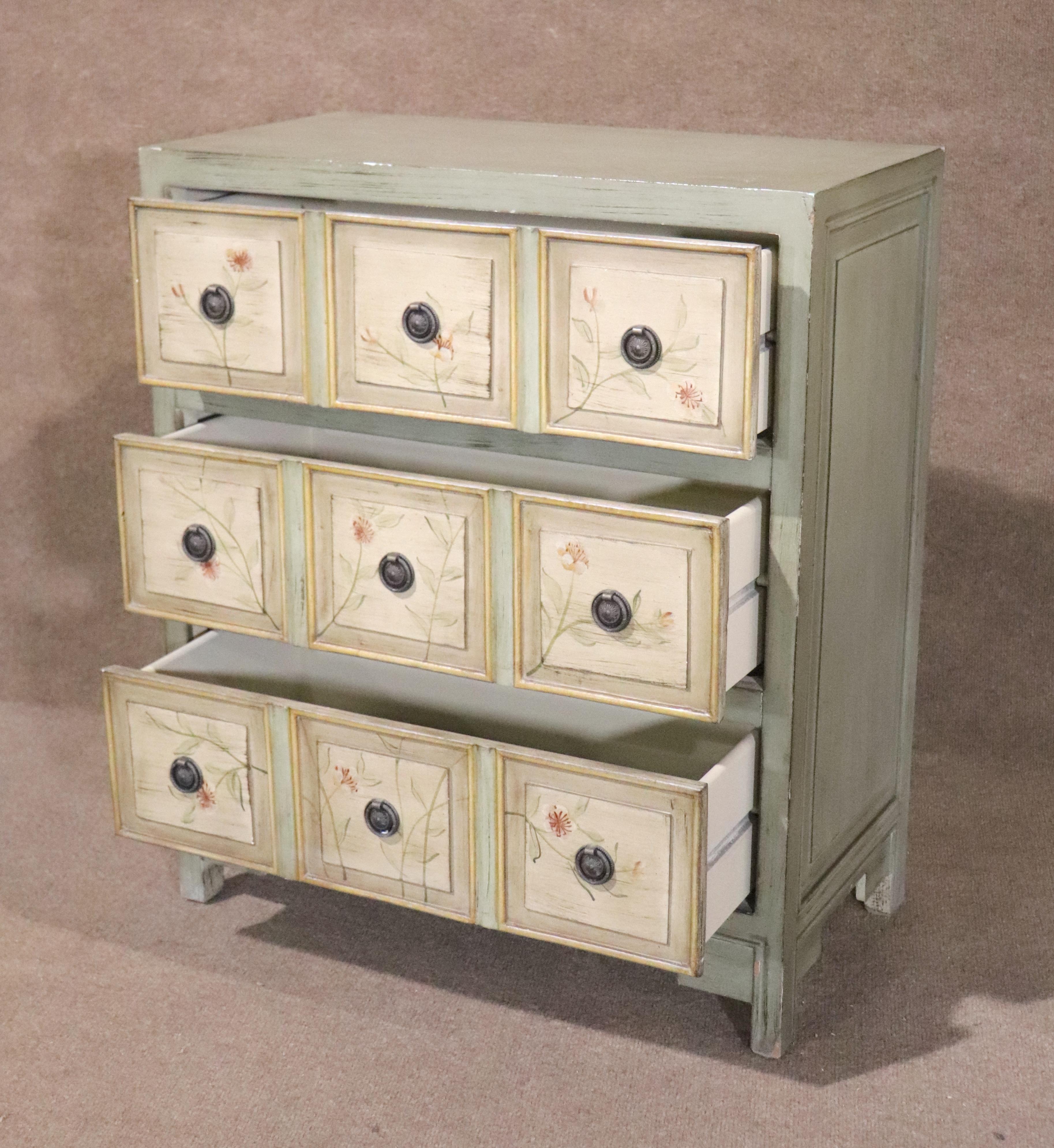This farmhouse style chest of drawers is painted with floral embellishments. Three wide drawers with metal hardware. Nice faded paint design.
Please confirm location NY or NJ