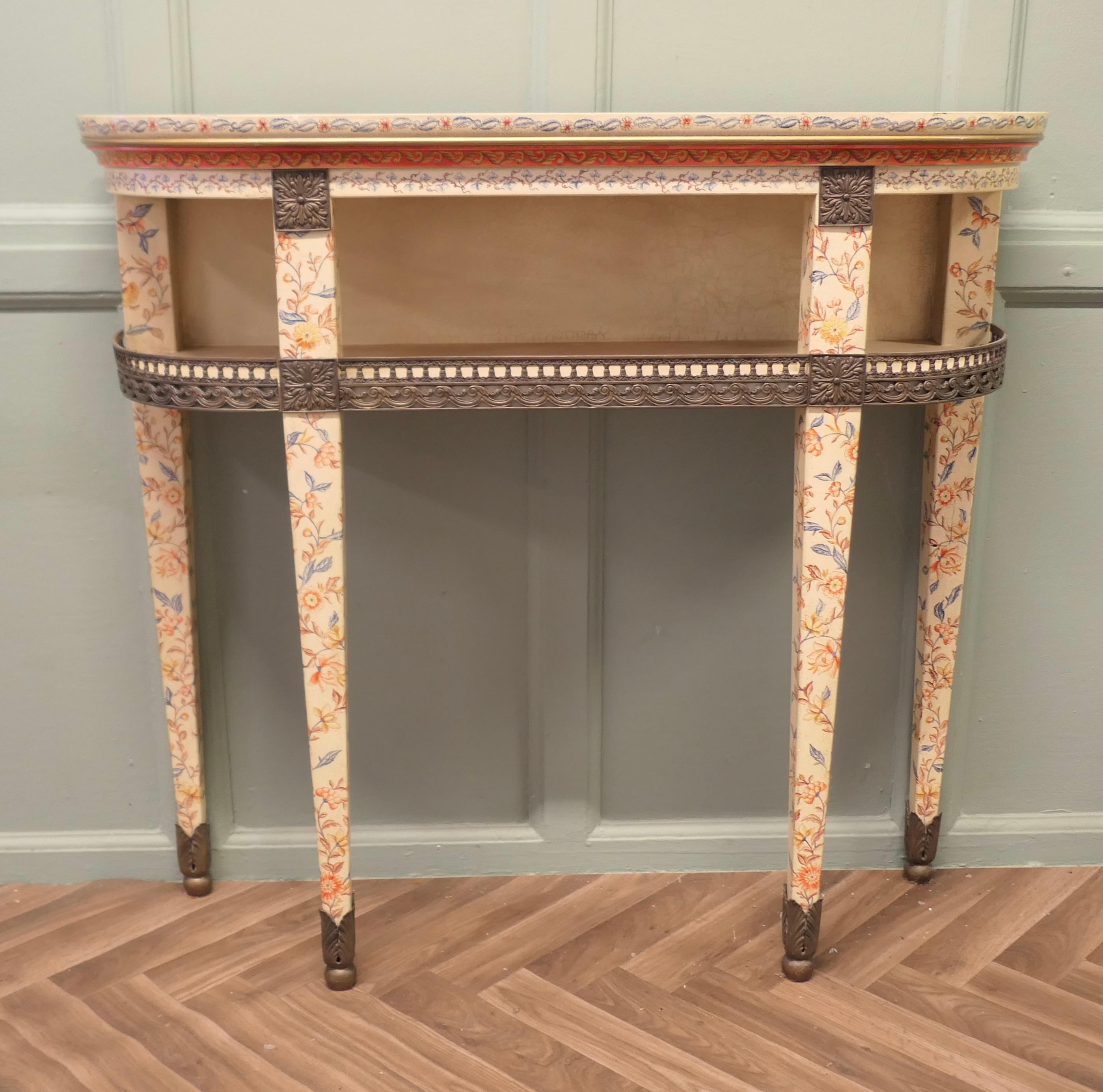 Painted Chinoiserie Console Table,  Imari Chinoiserie Style

 This is a very attractive piece, the table is painted in fine detail with a floraI Imari Style in blue and coral colours over a crackle undercoat. The table has a brass gallery around the