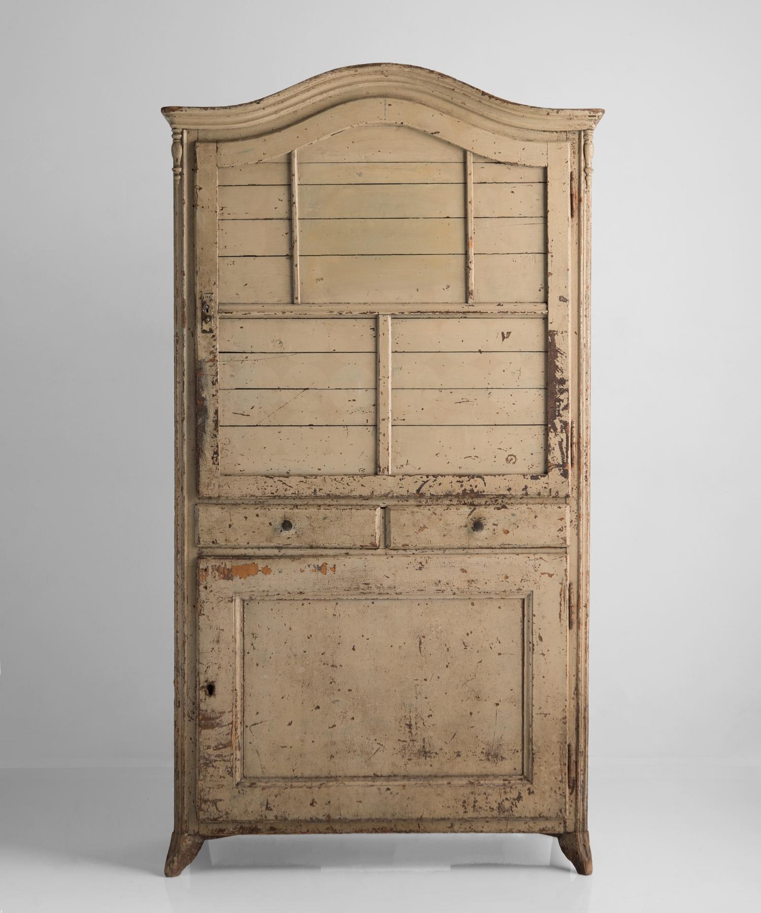 Painted cupboard, France, 18th century.

Wonderfully patinated, tall form with original paint.