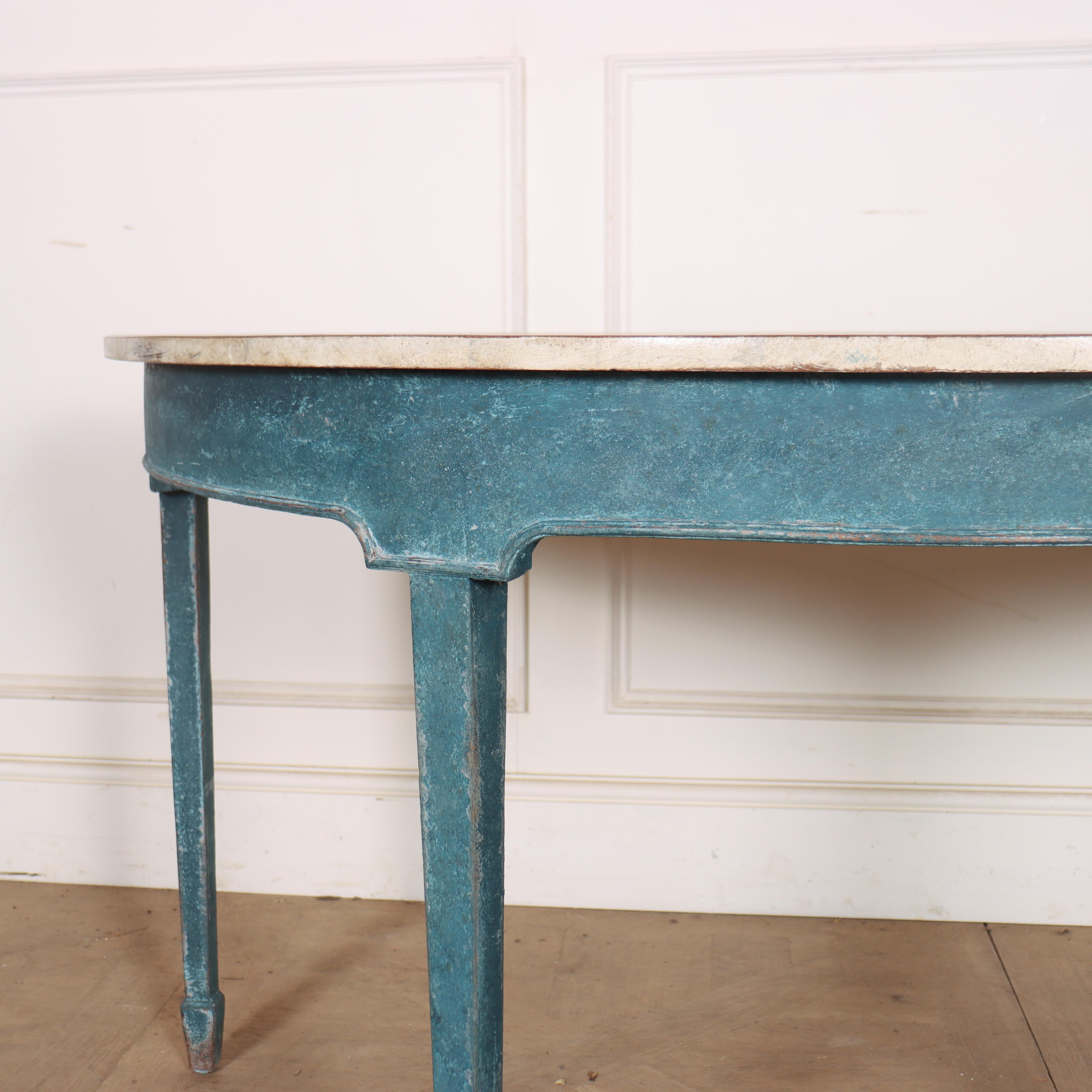 Large early 19th century English painted pine demi-lune console table with a painted faux marble top. 1820.


Code: 8834

Dimensions:
W: 54