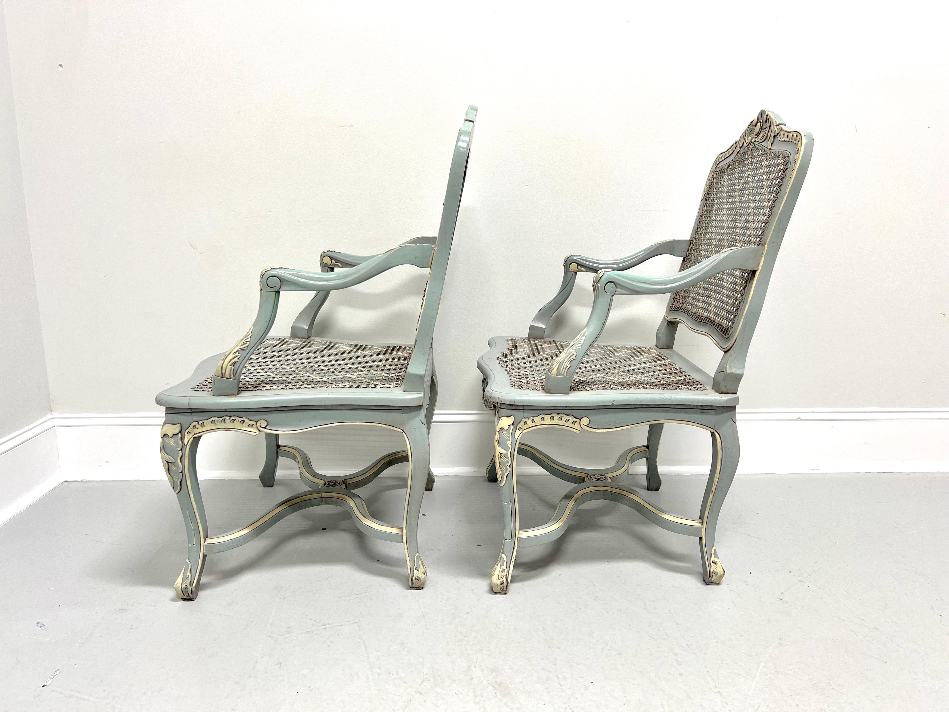 20th Century Painted Distressed Pale Blue & Ivory French Louis XV Caned Armchairs - Pair