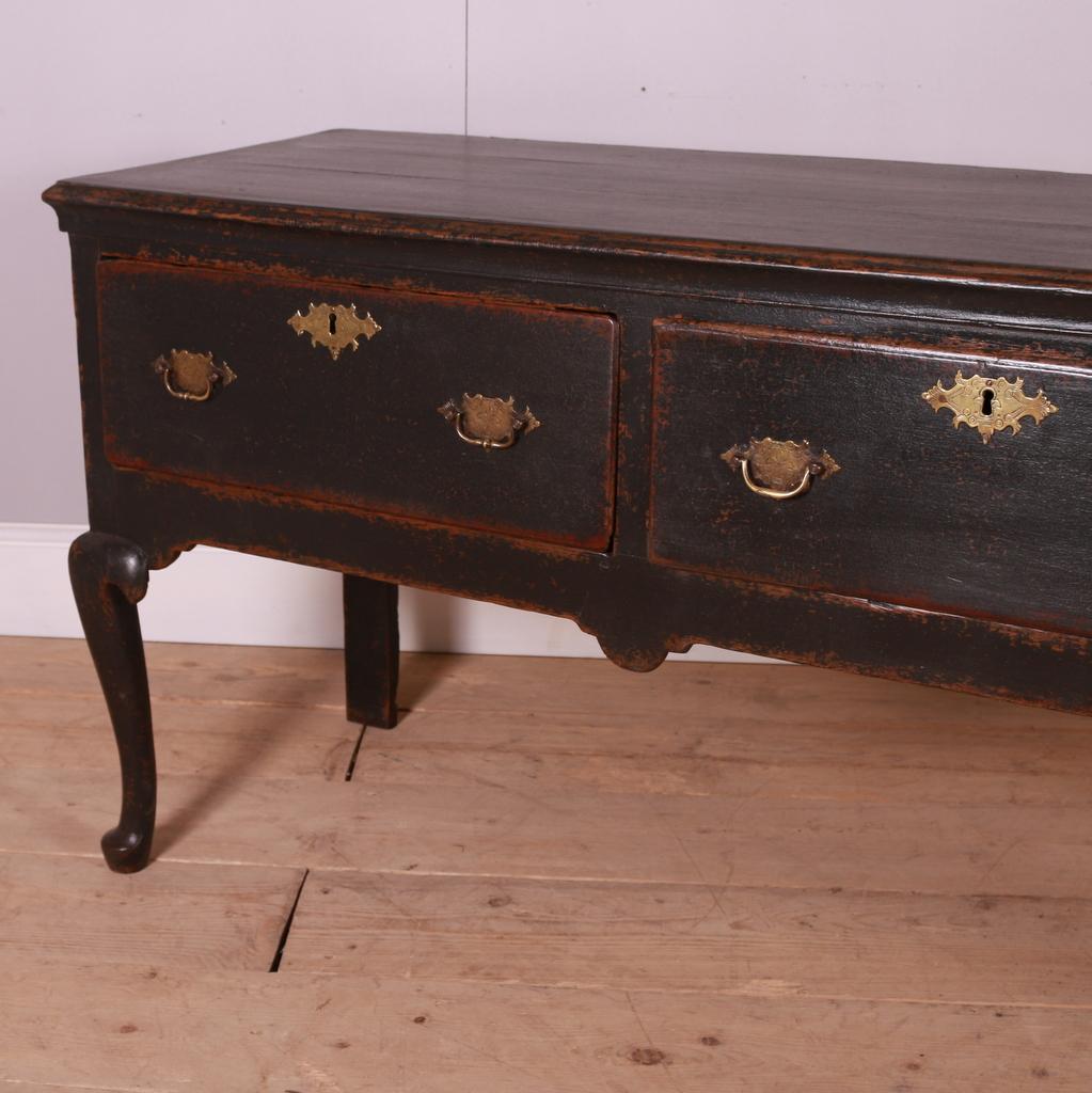 Good 18th C painted dresser base. 1780.

Dimensions
74 inches (188 cms) Wide
20.5 inches (52 cms) Deep
30 inches (76 cms) High.