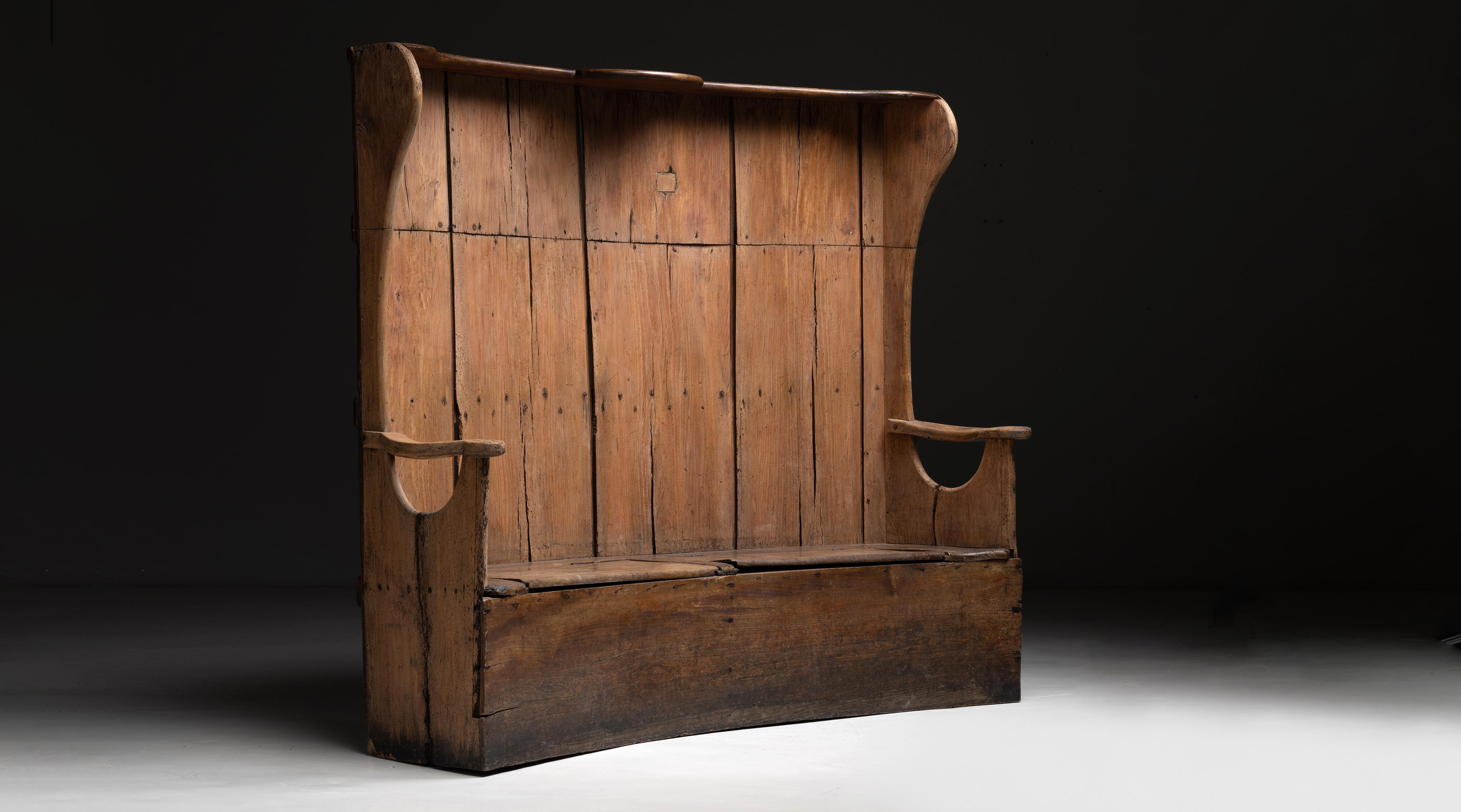 Painted elm box seat settle

England, circa 1790

Planked elm backrest with oak box seat and shaped armrests.

Measures : 71” L x 22” d x 61.5” h x 15.5”seat.