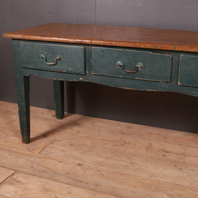 Late 18th century three-drawer painted dresser base, 1790

Dimensions
63 inches (160 cms) wide
22 inches (56 cms) deep
29 inches (74 cms) high.

 