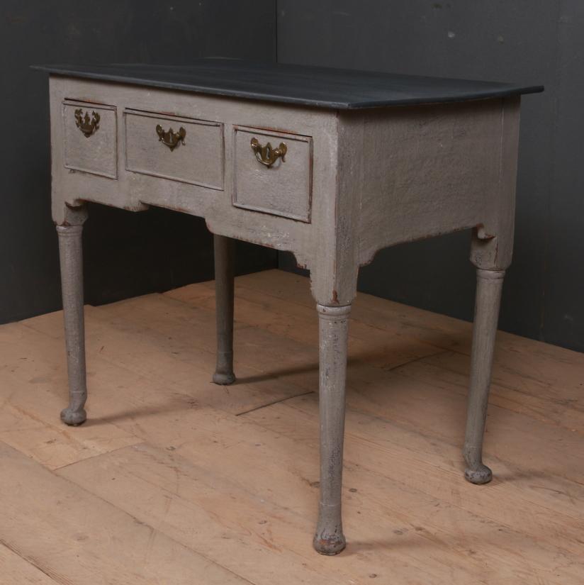 Late 18th century English painted lowboy with pad feet, 1790.

Dimensions:
34 inches (86 cms) wide
18 inches (46 cms) deep
28 inches (71 cms) high.

 