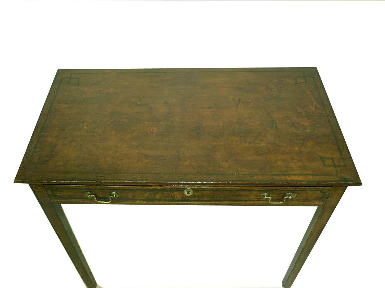 Painted English one drawer table with simulated inlay design on the top and drawer. Nice weathered patina.