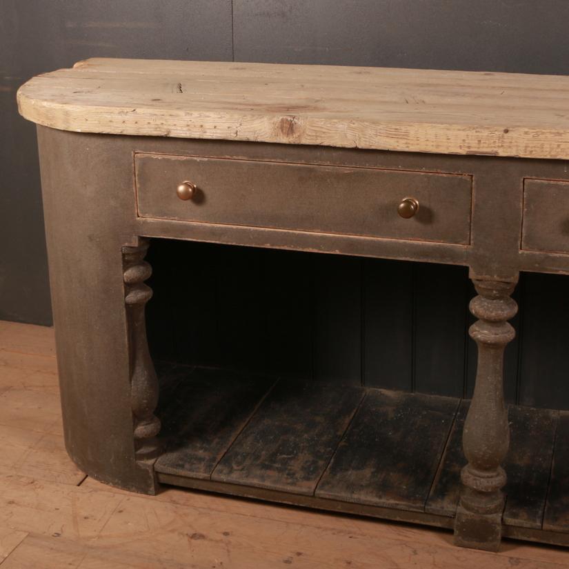 Wonderful 19th century D-end Bath dresser base with a huge thick scrubbed top, 1810

Dimensions:
95 inches (241 cms) wide
26 inches (66 cms) deep
38 inches (97 cms) high.
  
   