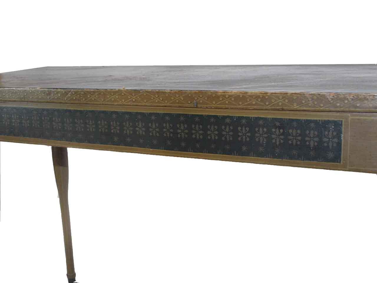 Painted faux marble console table, the faux marble top with extremely bold and beautiful graining , the top molding has a painted repeating design, the side rails and front have an unusual stylized star and flower design, the slender turned legs