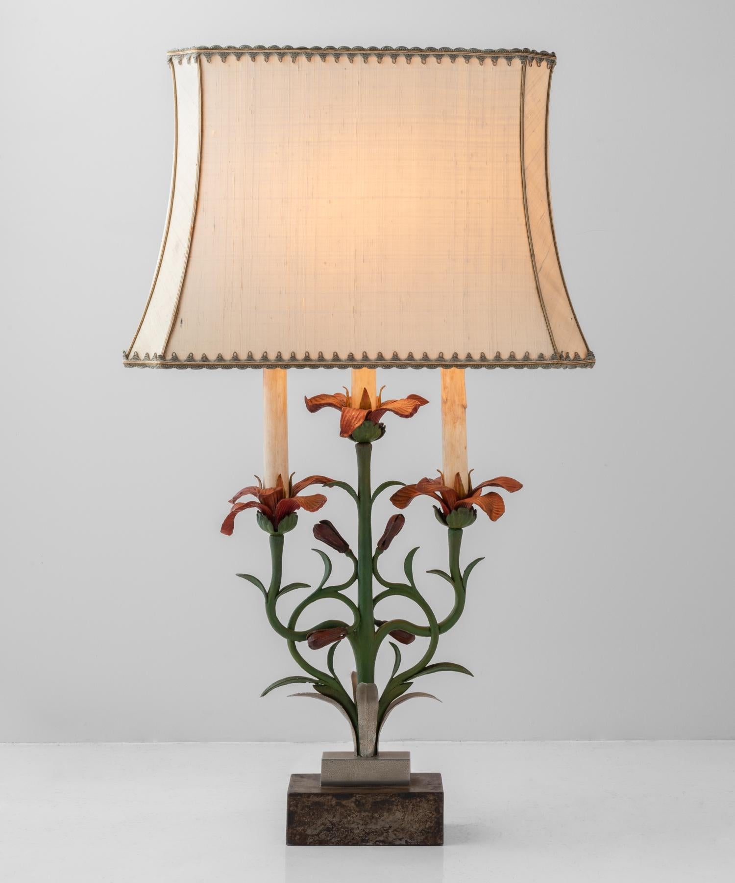 Painted floral cast iron table lamp, Italy, circa 1900.

Painted cast iron with unique detailing and original shade.