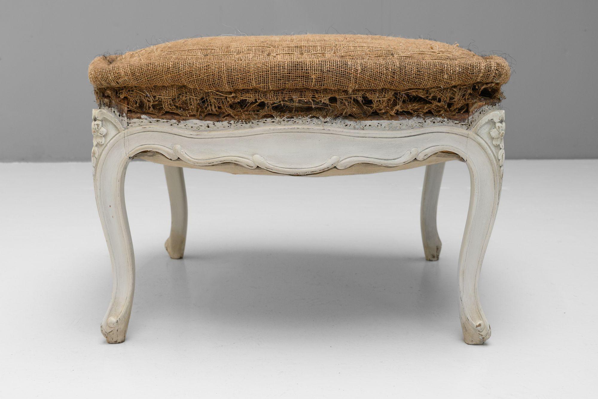 Cabriole leg French footstool in later painted finish. Circa 1890.

H 44cm x W 70cm x D 70cm