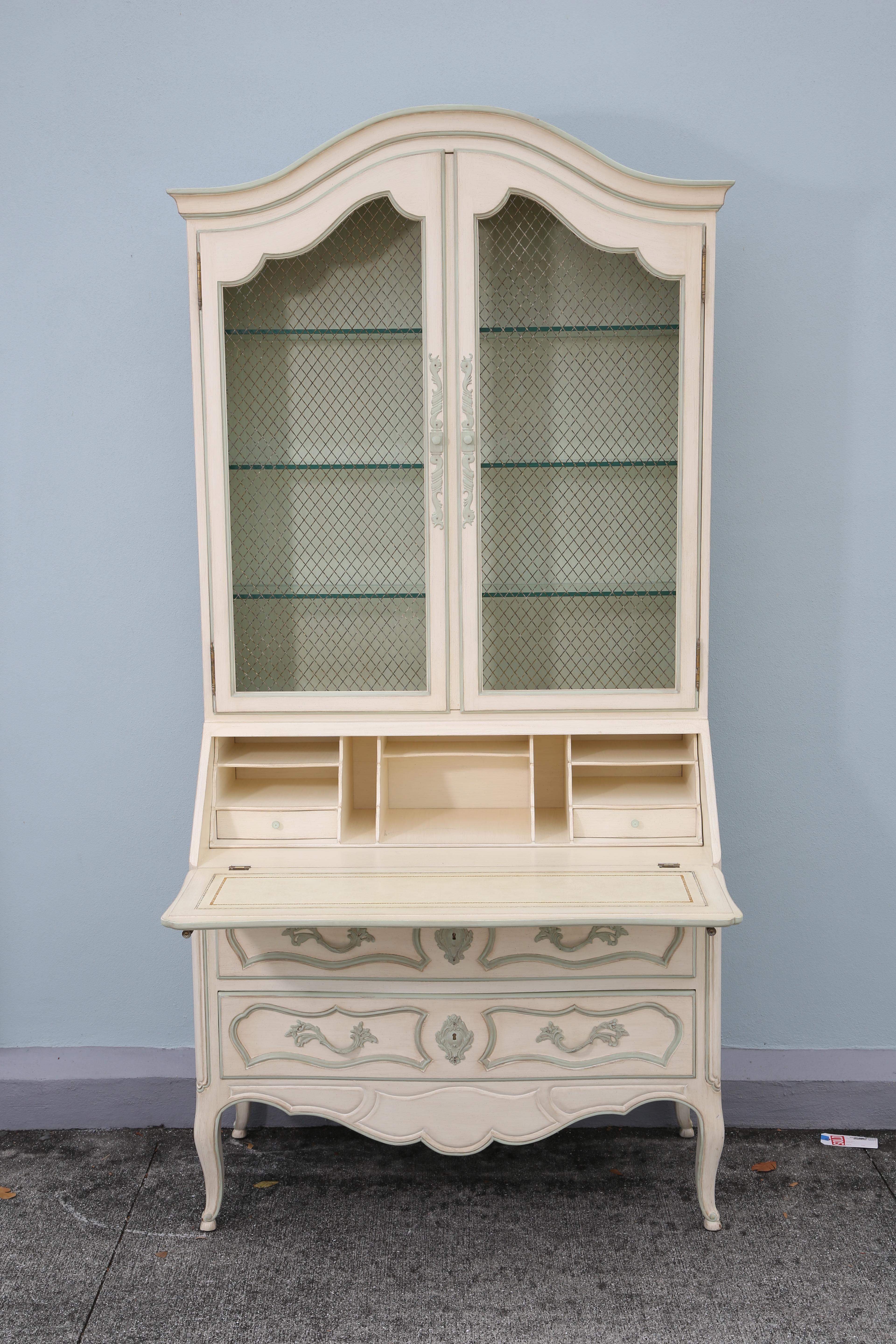Country French painted secretary with two drawers below fitted interior. Chicken wire upper doors.